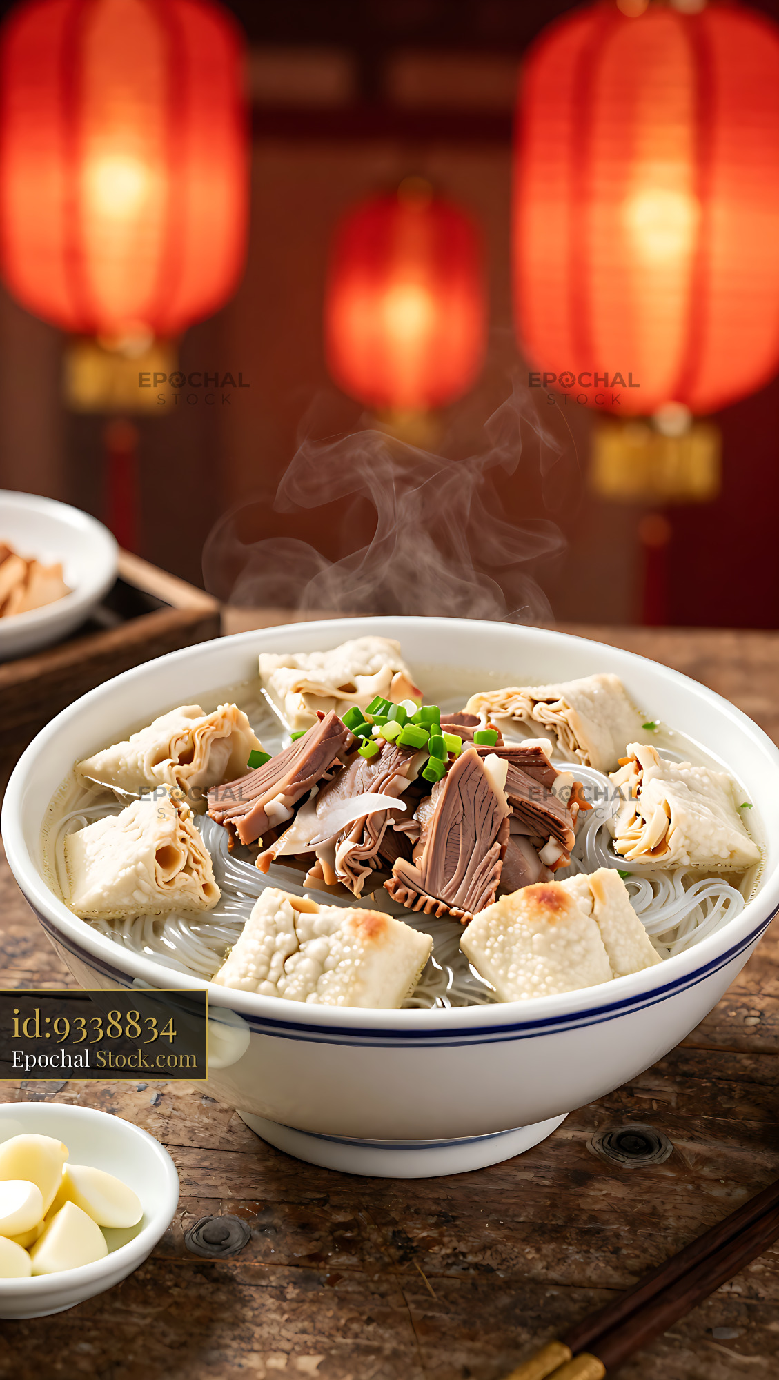 Traditional Yangrou Pao Mo lamb soup with crumbled bread and steam - stock photo