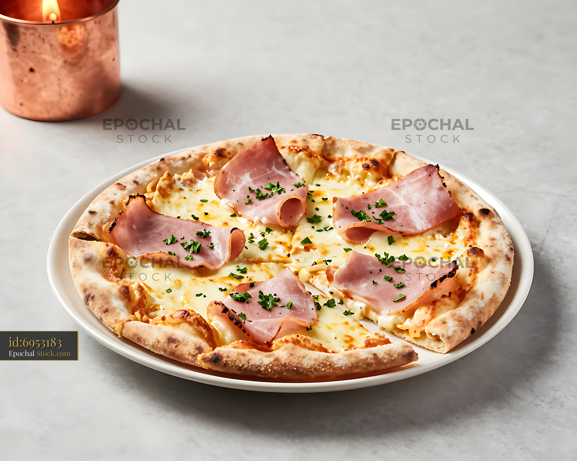 Gourmet calzone al cotto e mozzarella topped with fresh herbs - stock photo