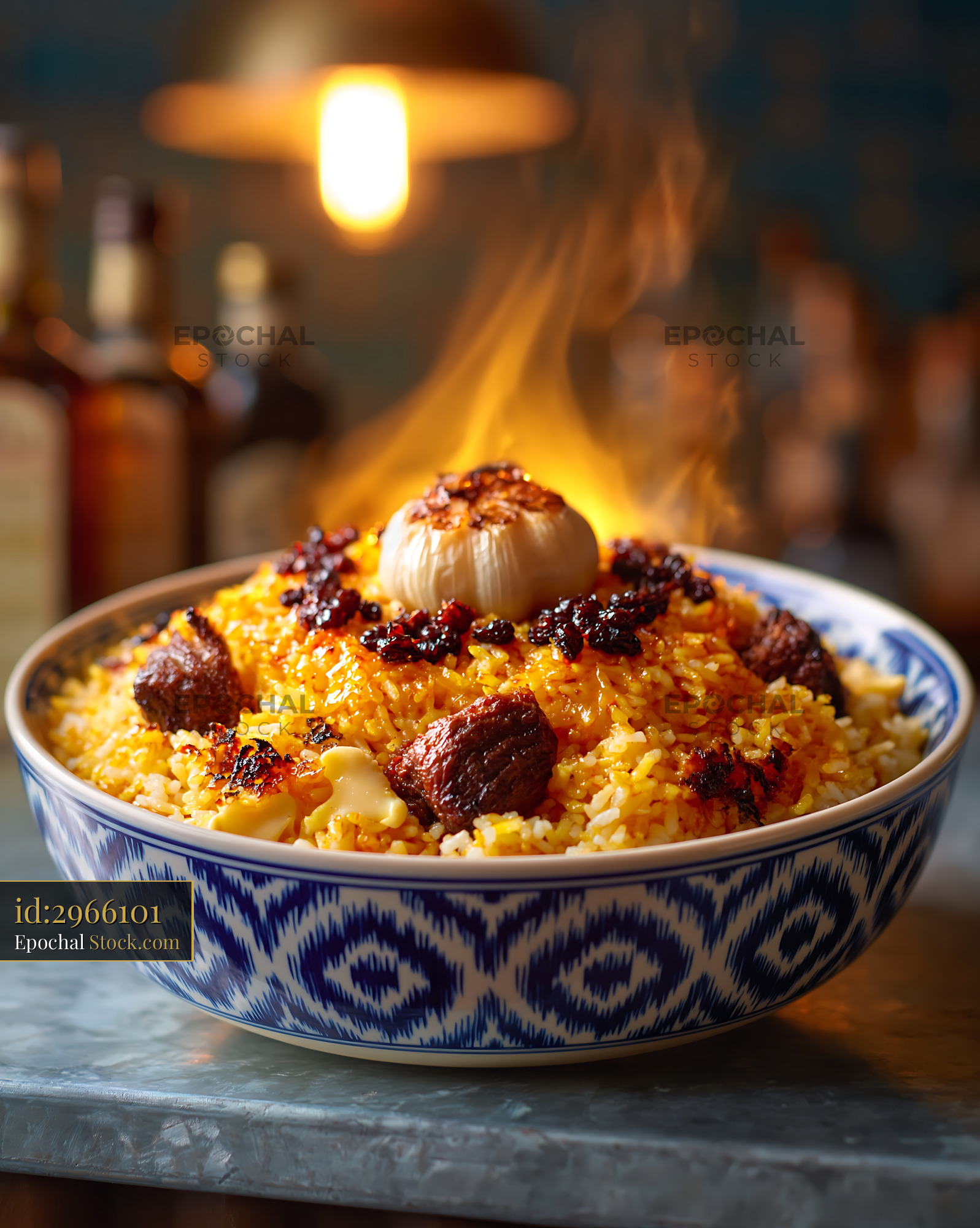 Traditional beef pilaf with roasted garlic and barberries served hot - stock photo
