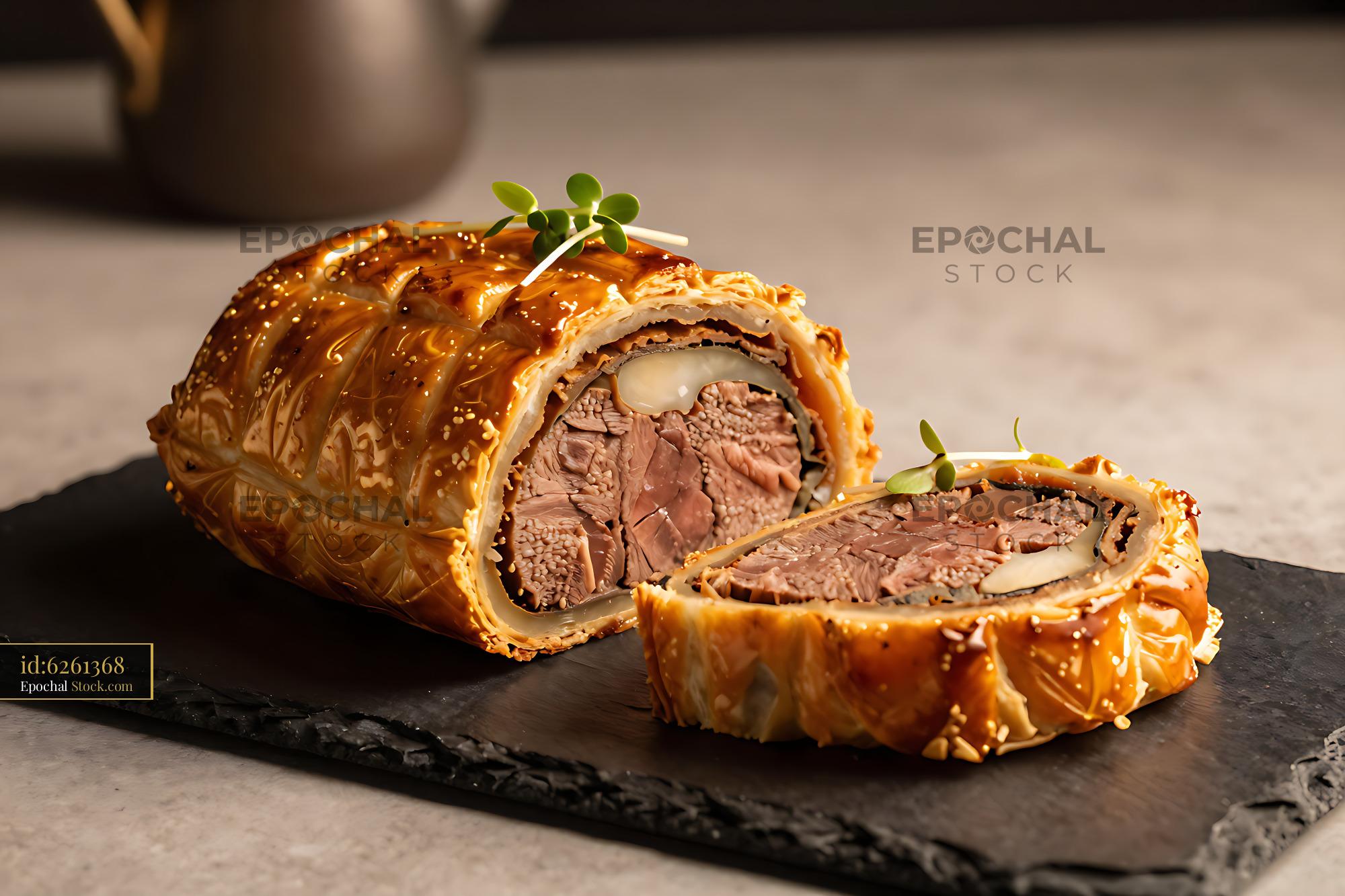 Eight Treasure Beef Wellington Chinese-style sliced on a slate board - stock photo