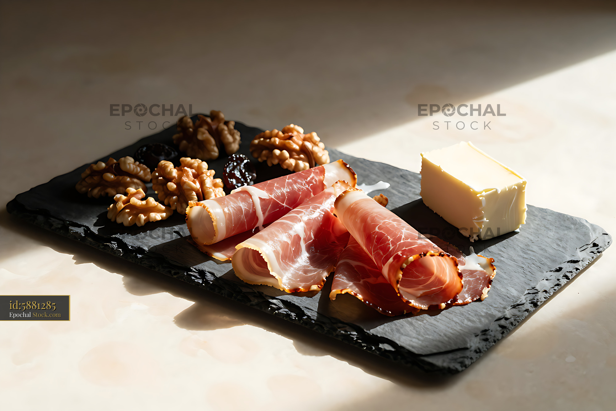Schwarzwaelder Schinken Brettljause with walnuts and butter on slate - stock photo