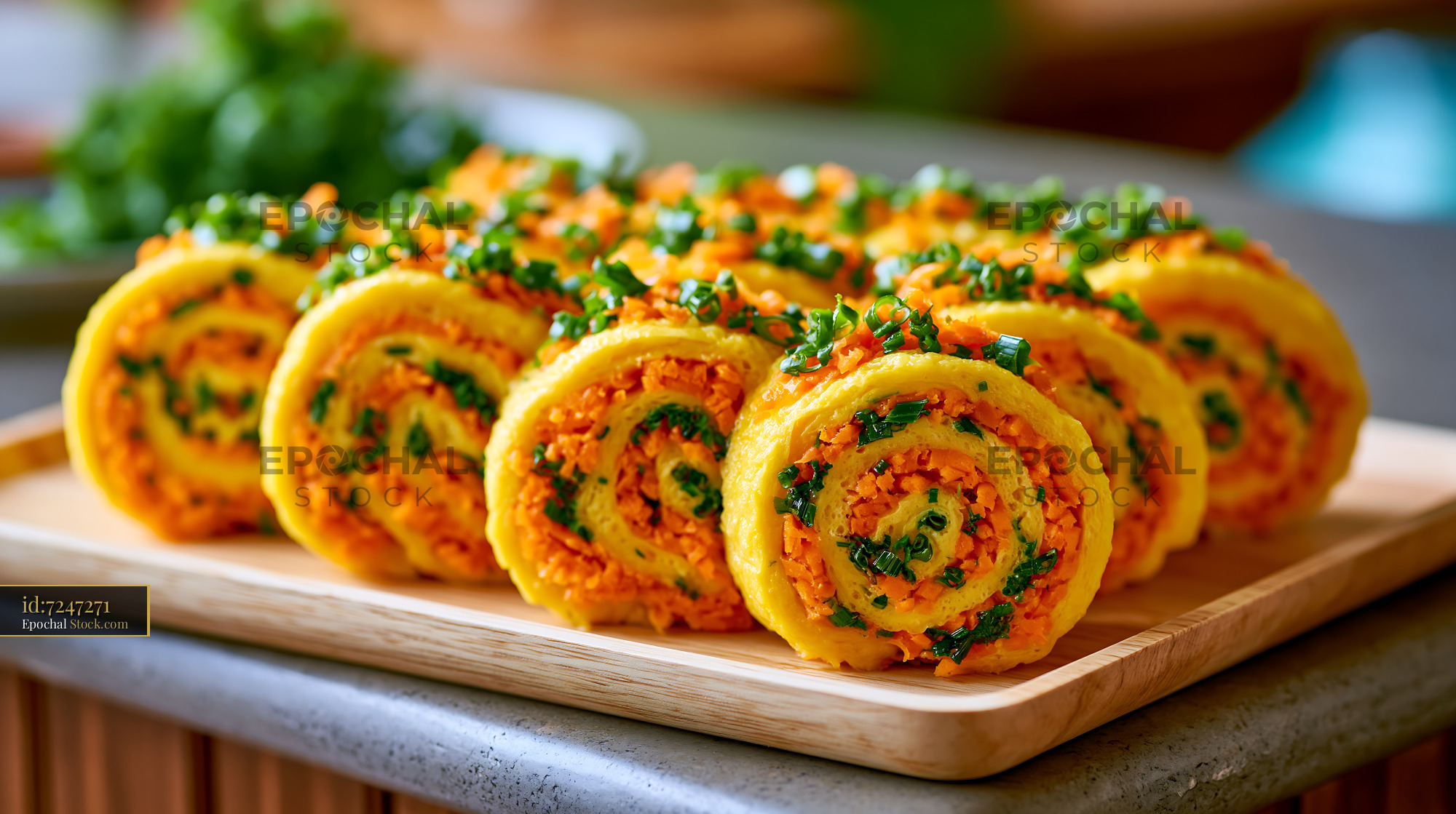 Gyeran mari egg food rolls with carrots and green onions on wood - stock photo