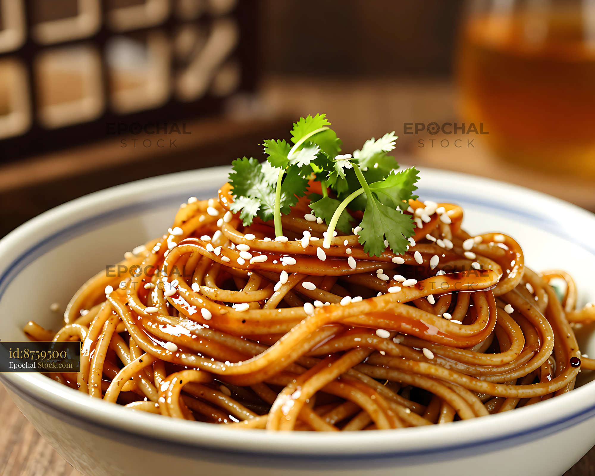 Bowl of spicy Youpo Che Mian noodles with sesame seeds and cilantro - stock photo
