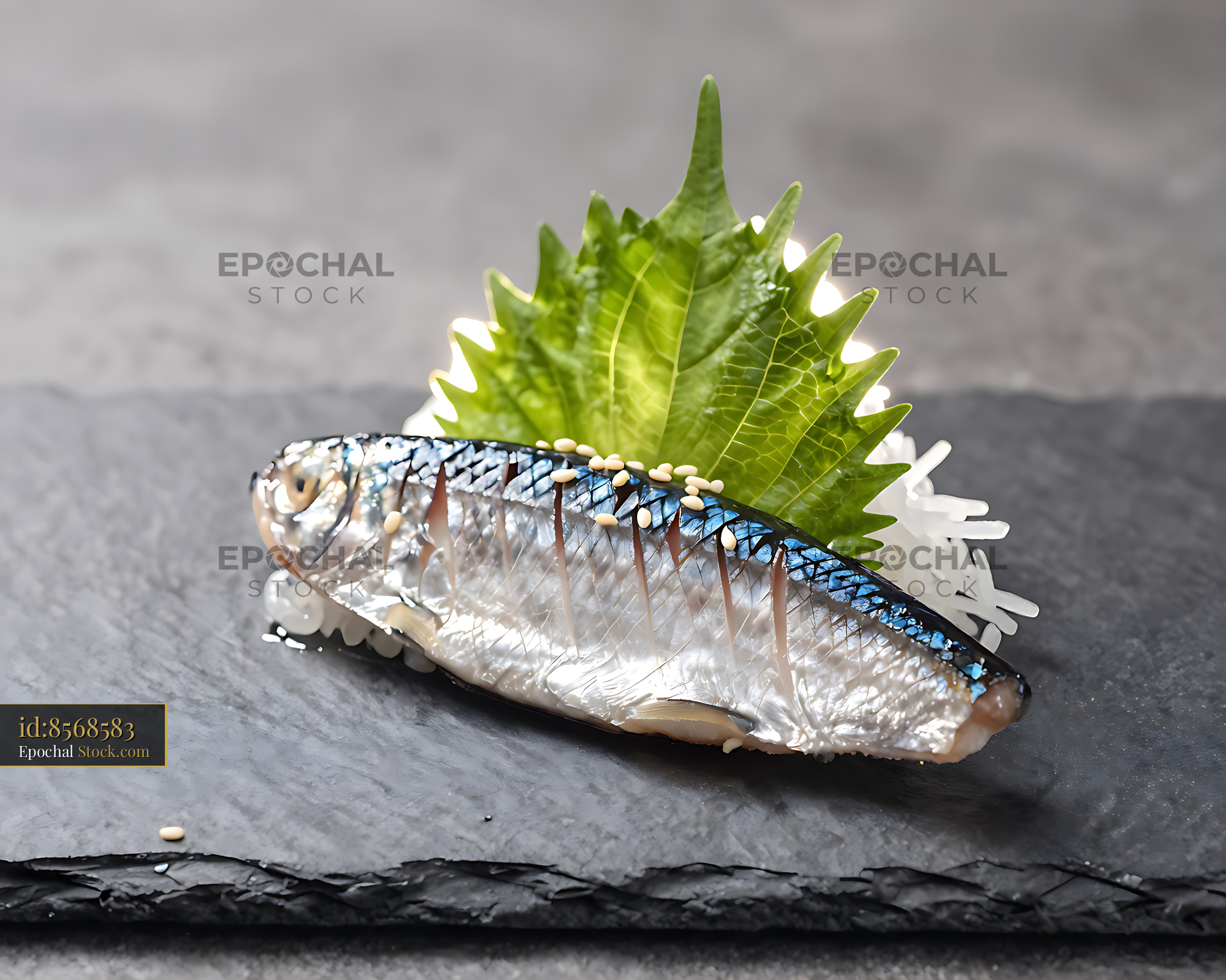 Fresh mamakari sushi with shiso leaf and sesame seeds on slate - stock photo