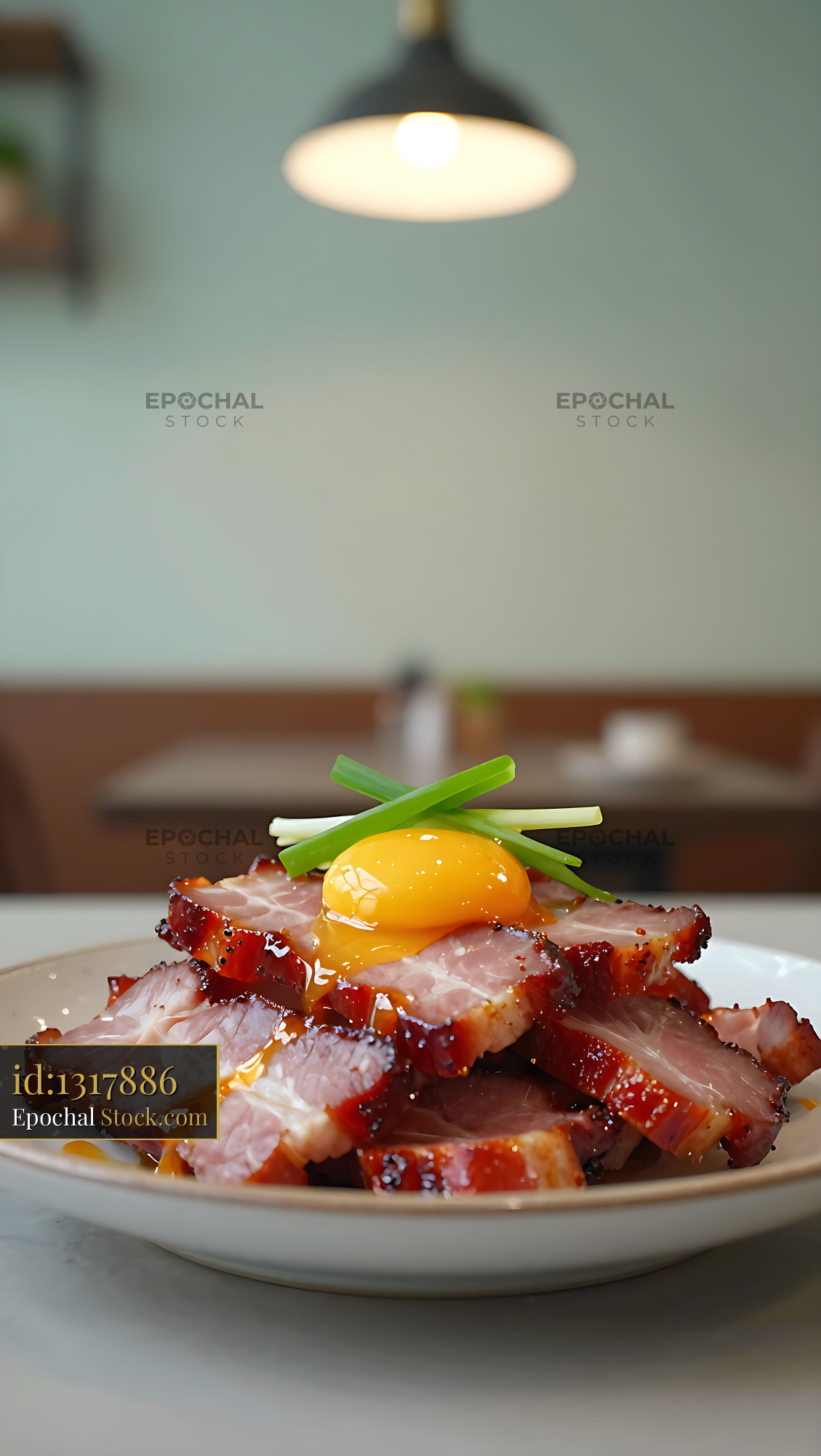 Kapampangan tocino served with raw egg yolk and spring onions - stock photo