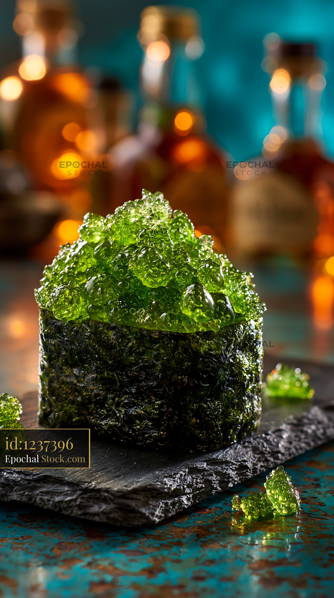 Gunkan maki sushi topped with fresh green umi budo sea grapes - stock photo