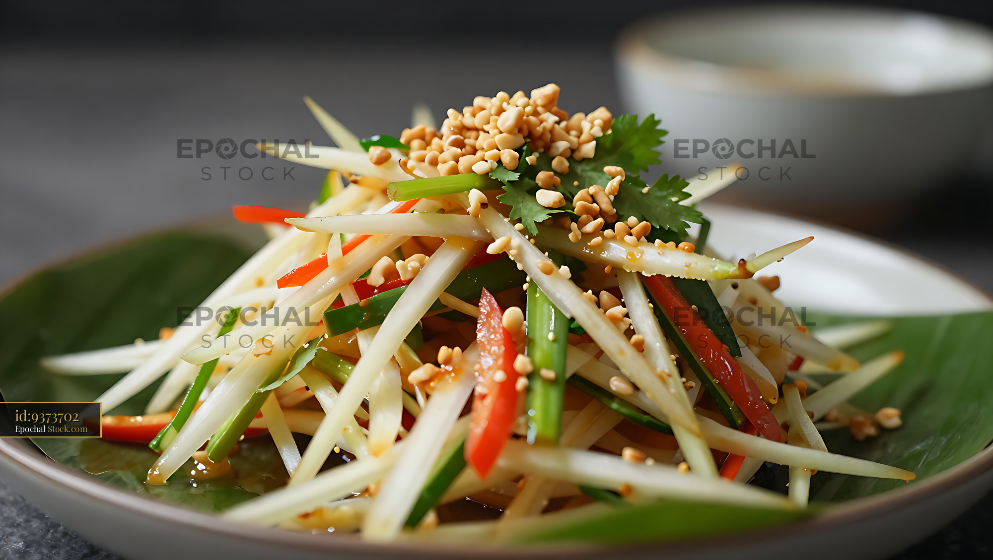 Authentic Thai Tam Maak Hoong Lao green papaya salad with peanuts - stock photo