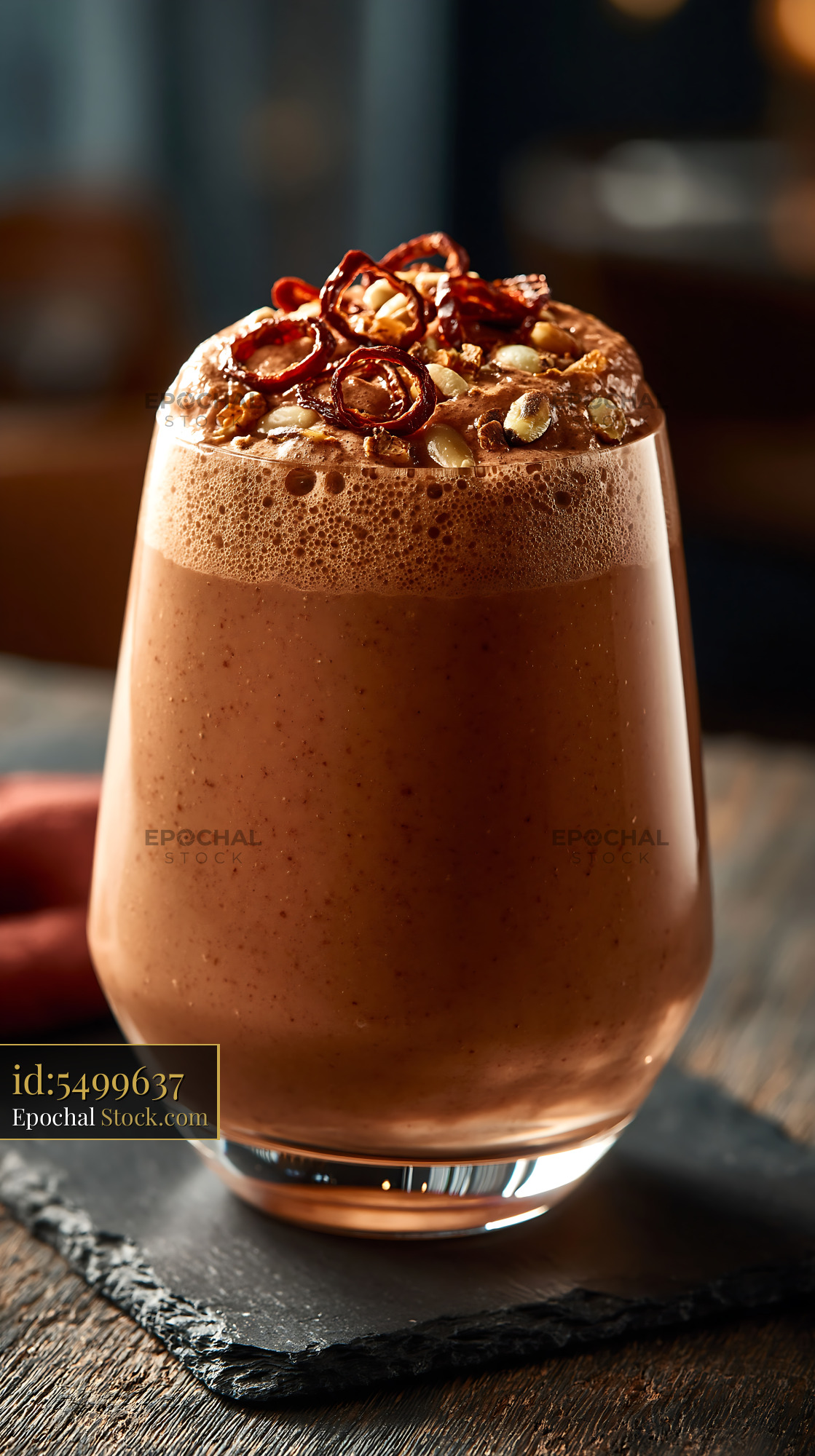 Daechu jujube smoothie with pine nuts in a glass on a wooden table - stock photo