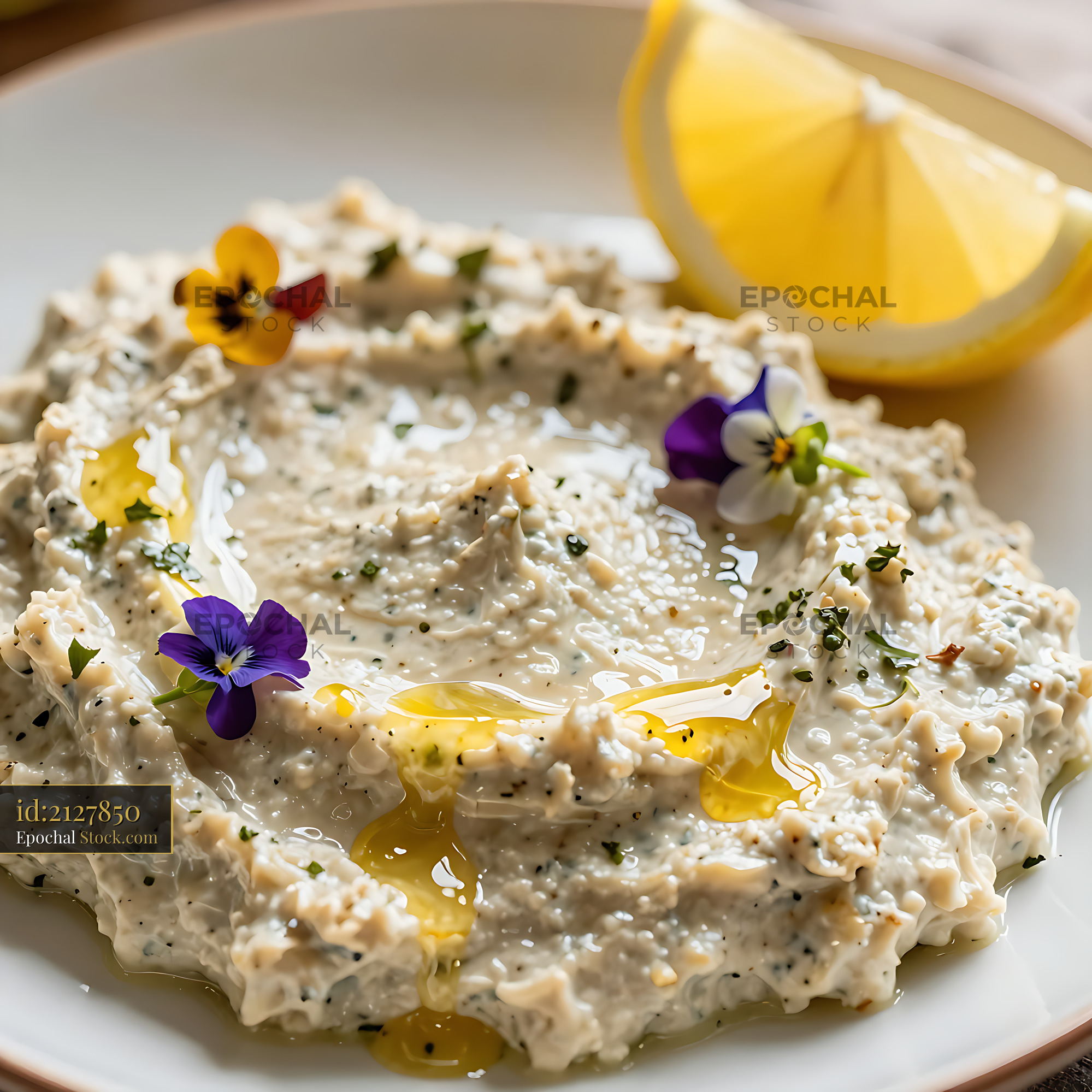 Bulgarian lyutenitsa spread salad garnished with edible flowers - stock photo