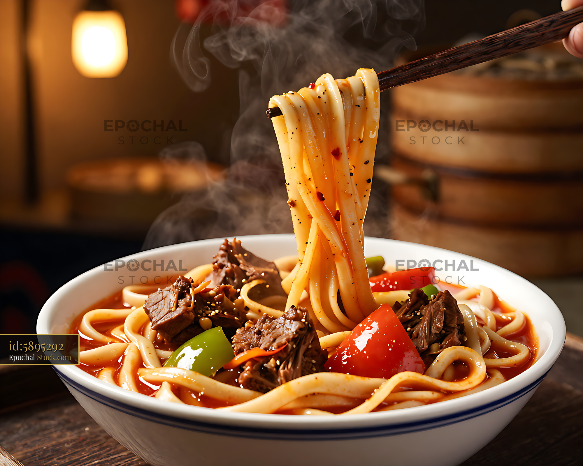 Xinjiang Laghman noodles with beef and vegetables in a steaming bowl - stock photo