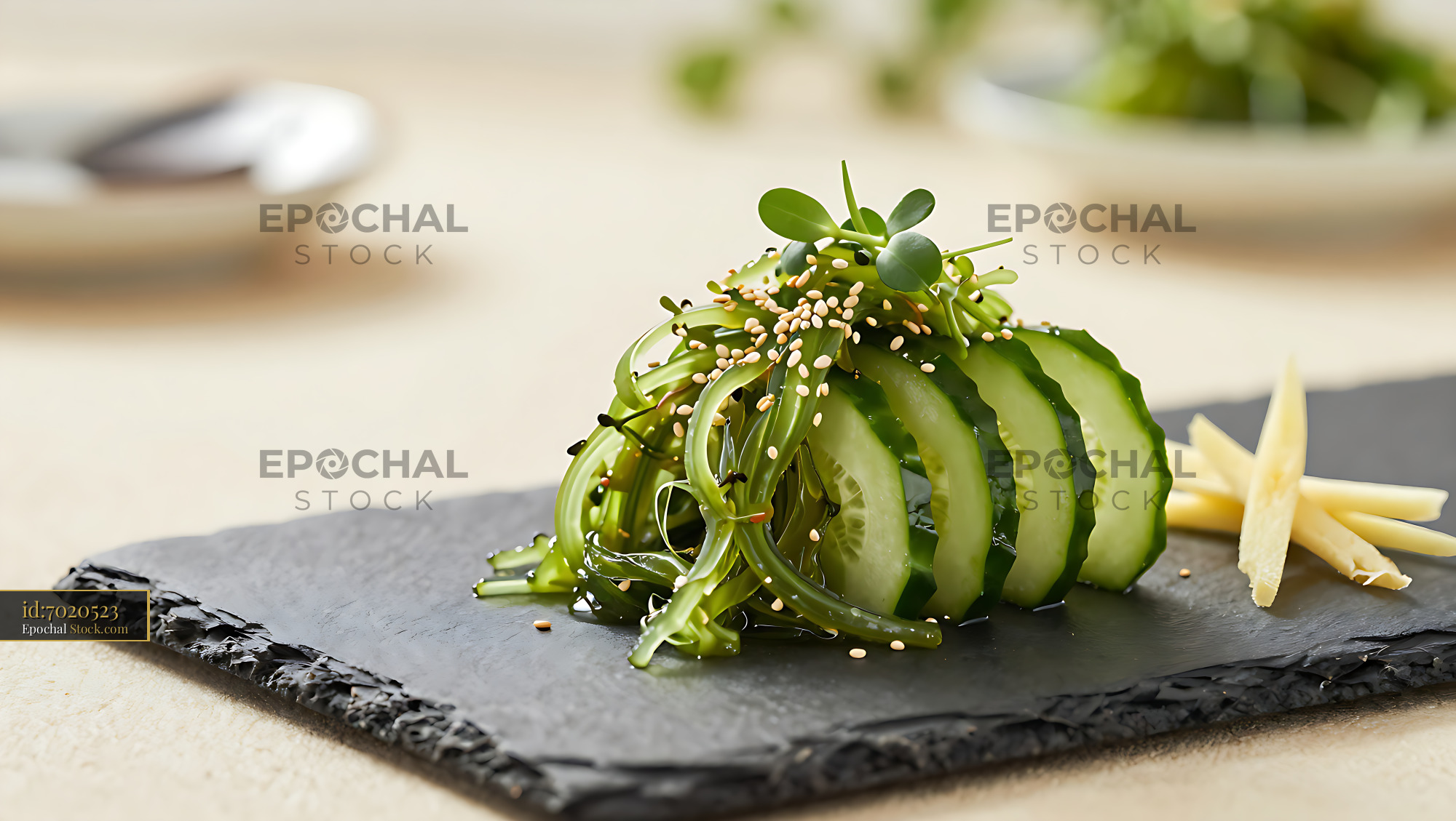 Japanese sunomono cucumber salad with seaweed and sesame seeds - stock photo