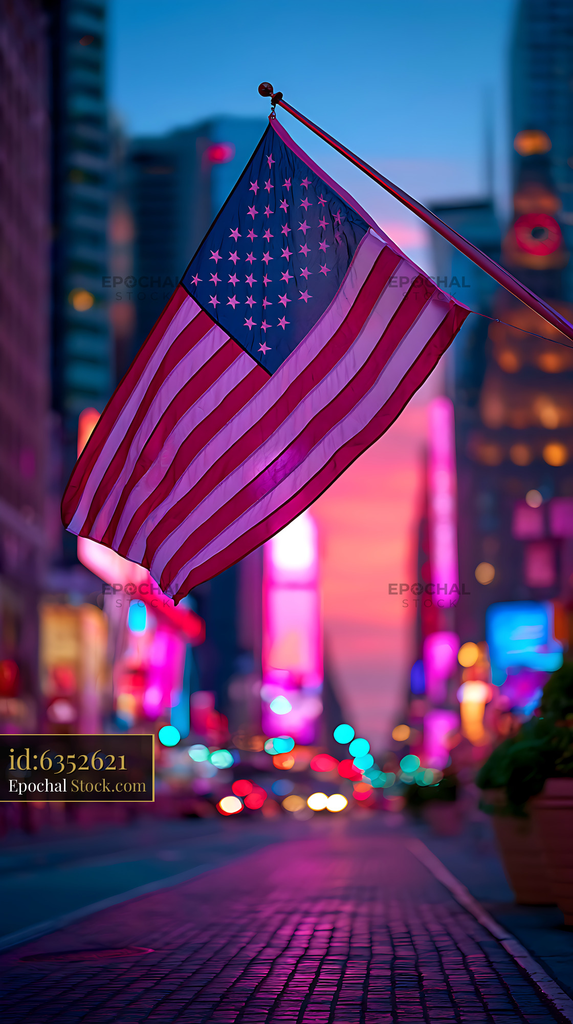 American flag hanging over a vibrant Times Square street at dusk - stock photo