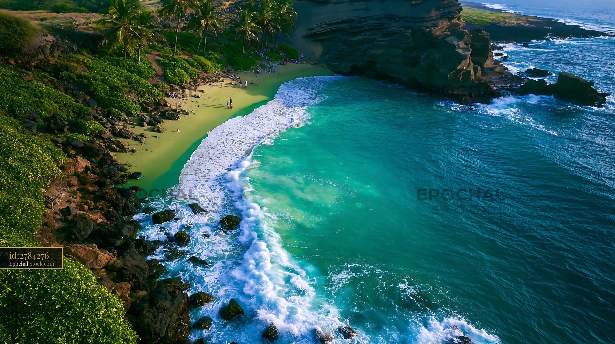 Aerial view of Papakolea green sand beach with turquoise ocean waves - stock photo