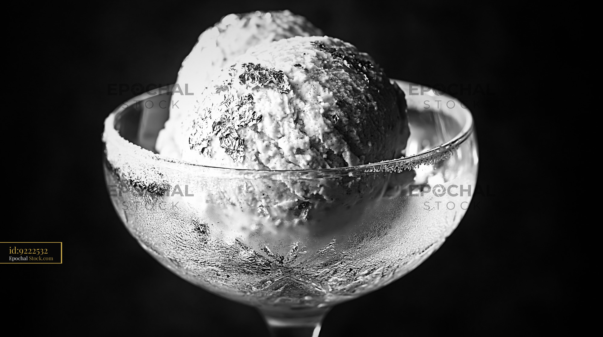 Prosecco ice cream scoops with edible silver leaf in a coupe glass - stock photo