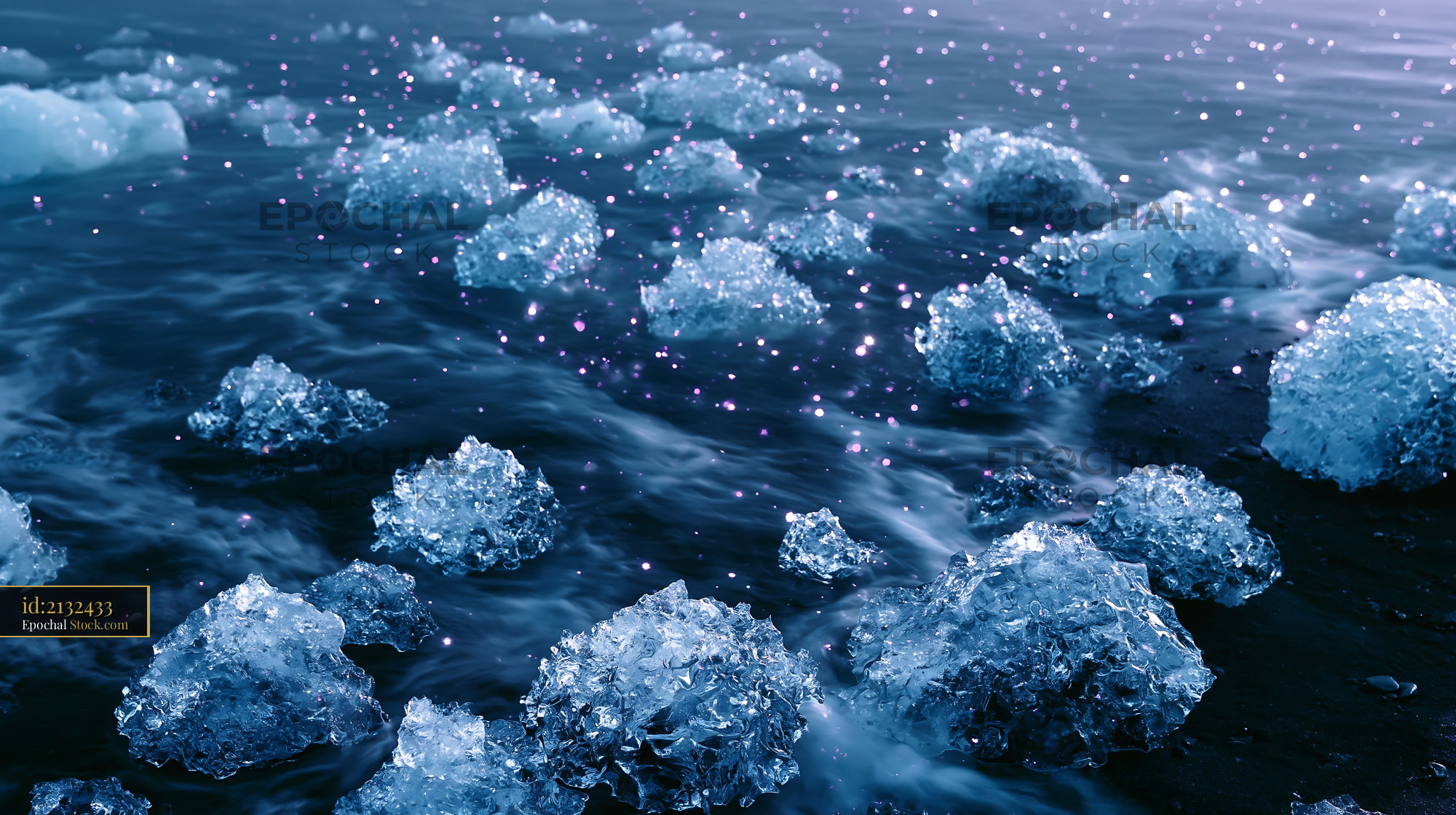 Aerial view of sparkling ice blocks on a black sand beach - stock photo