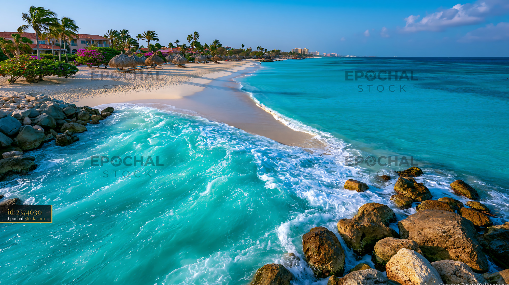 Aerial perspective of turquoise ocean and white sand beach in Aruba - stock photo