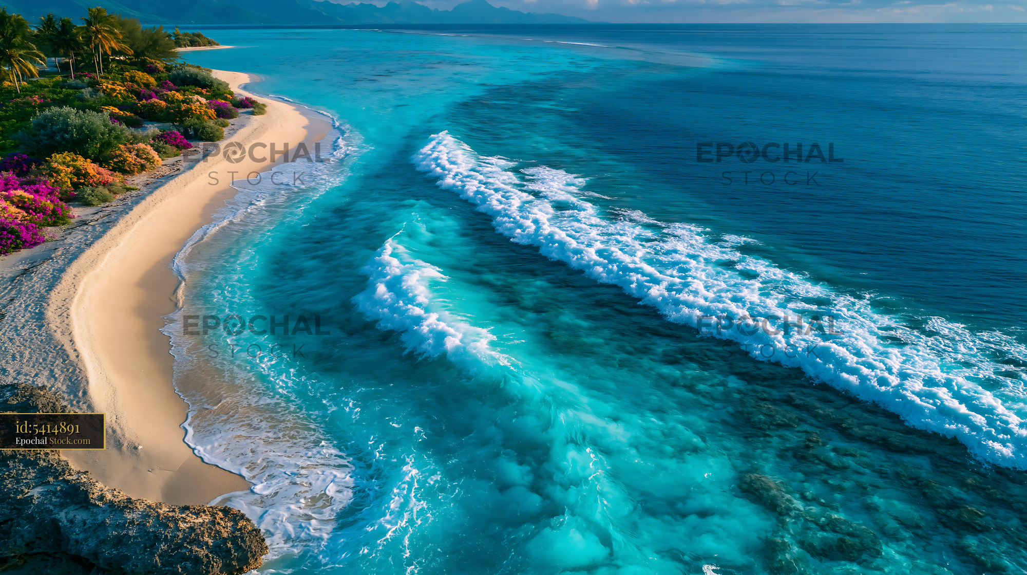 Aerial view of turquoise waves crashing on a tropical beach - stock photo