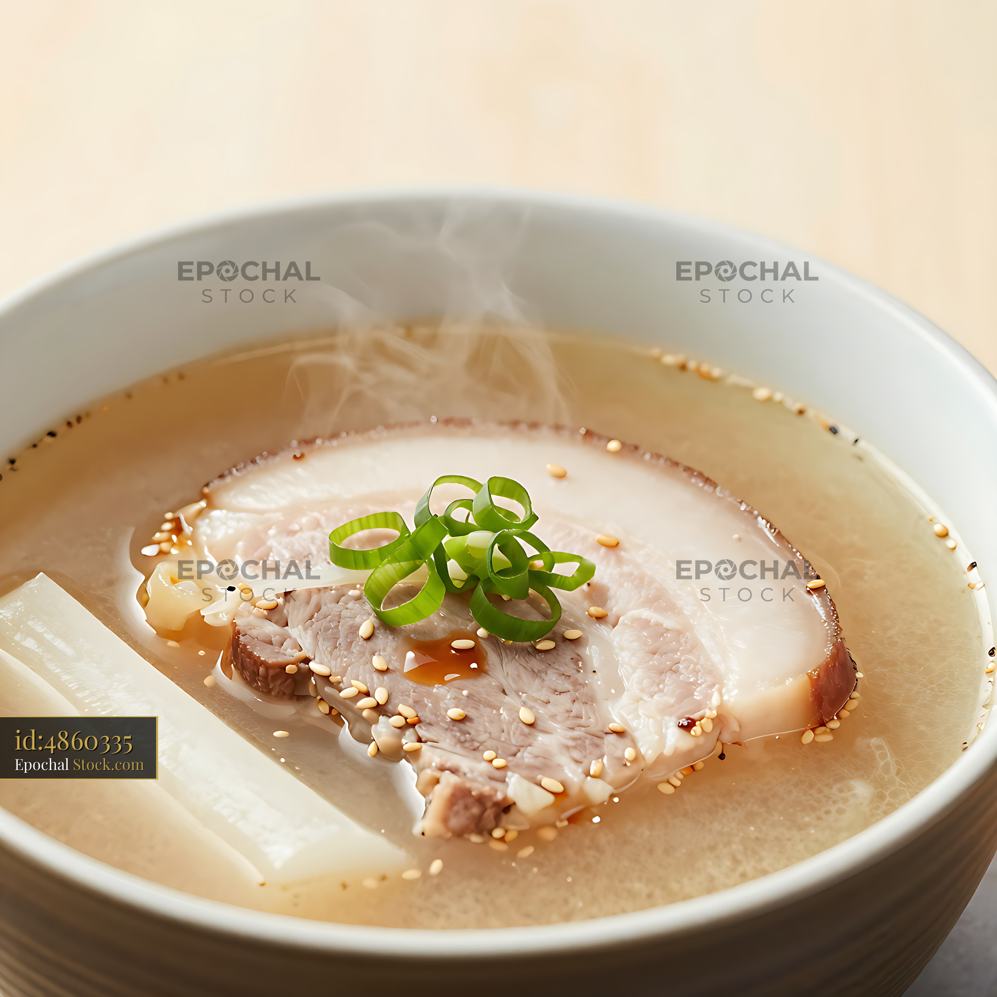 Steaming bowl of Aomori Tsugaru Senbei Jiru with sliced pork - stock photo