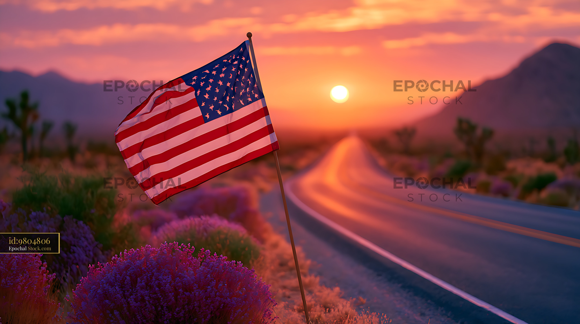 American flag standing by a desert highway at sunset in Mojave - stock photo