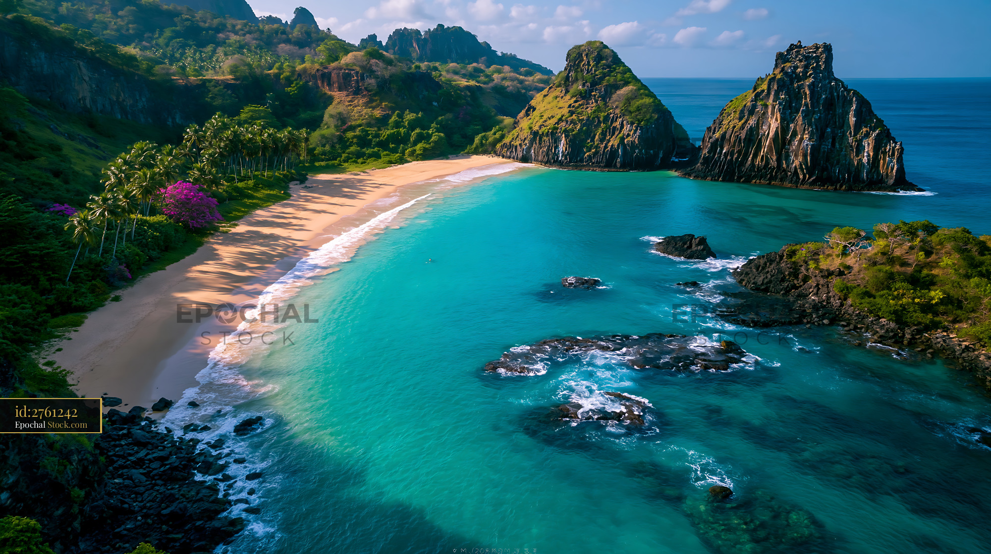 Tropical paradise beach with turquoise water and volcanic rock formati - stock photo