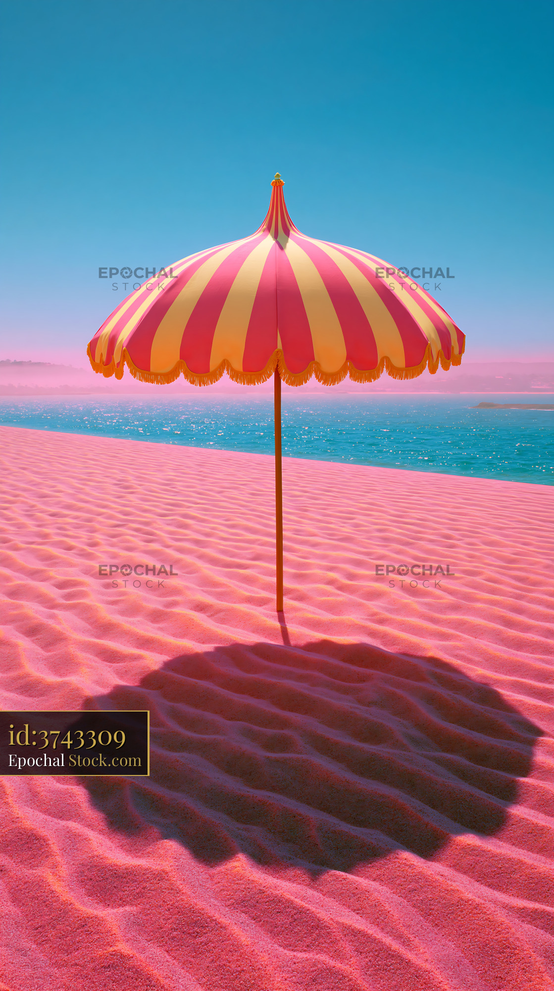 Vintage striped sun umbrella on a vibrant pink sand beach by the sea - stock photo