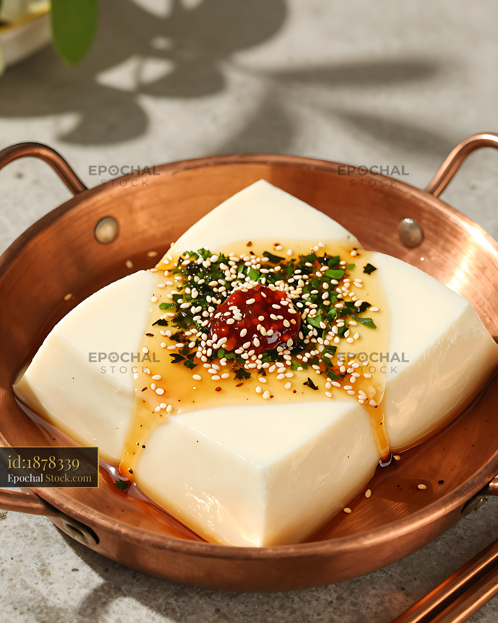 Taiwanese cold tofu salad with chili and sesame in a copper bowl - stock photo