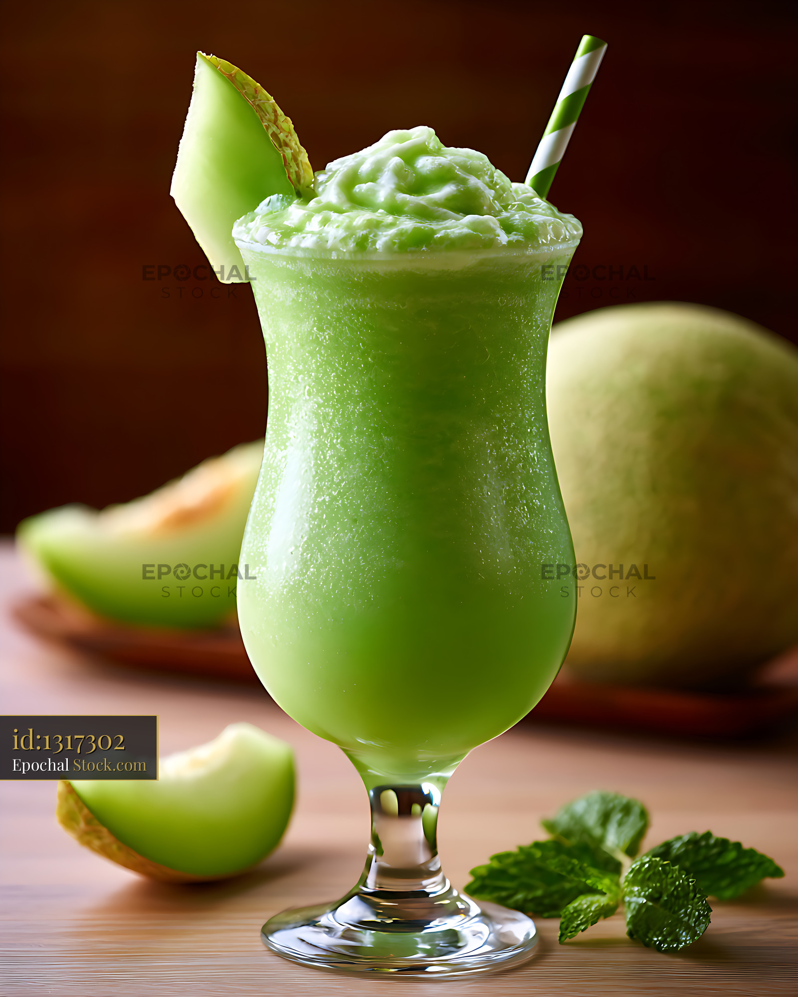 Refreshing honeydew melon milkshake in a glass with fresh fruit - stock photo