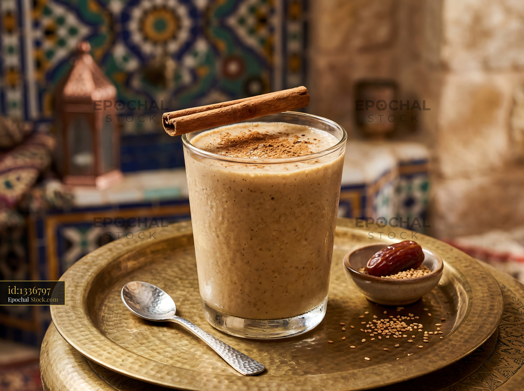 Tahini Date Shake with Cinnamon in Exotic Setting - stock photo