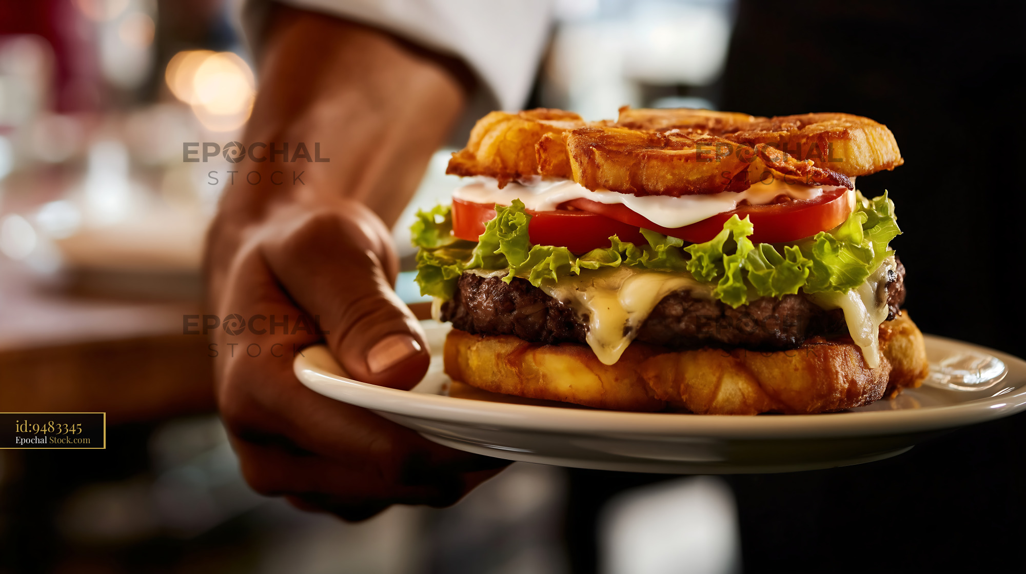 Jibarito Burger with Plantain Buns Held by Chef in Fine Dining Restaurant - stock photo
