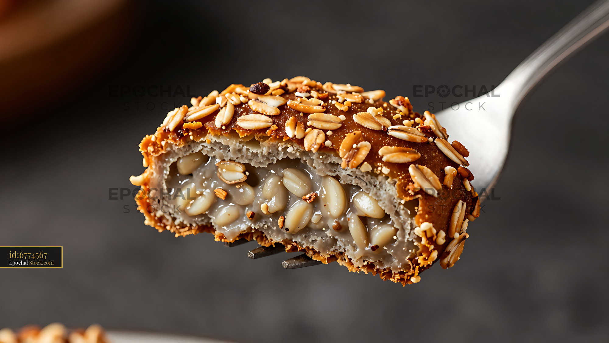 Goetta Pan-Fried Breakfast Meat Sliced on Fork with Sesame Seeds - stock photo