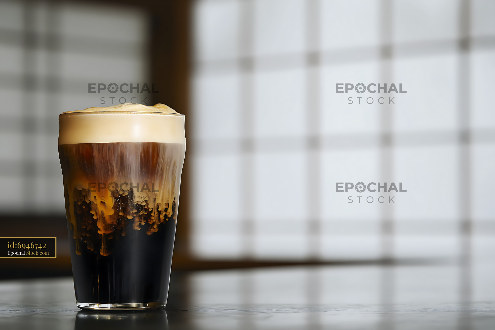 Nitro Caramel Coffee with Creamy Foam Head - stock photo