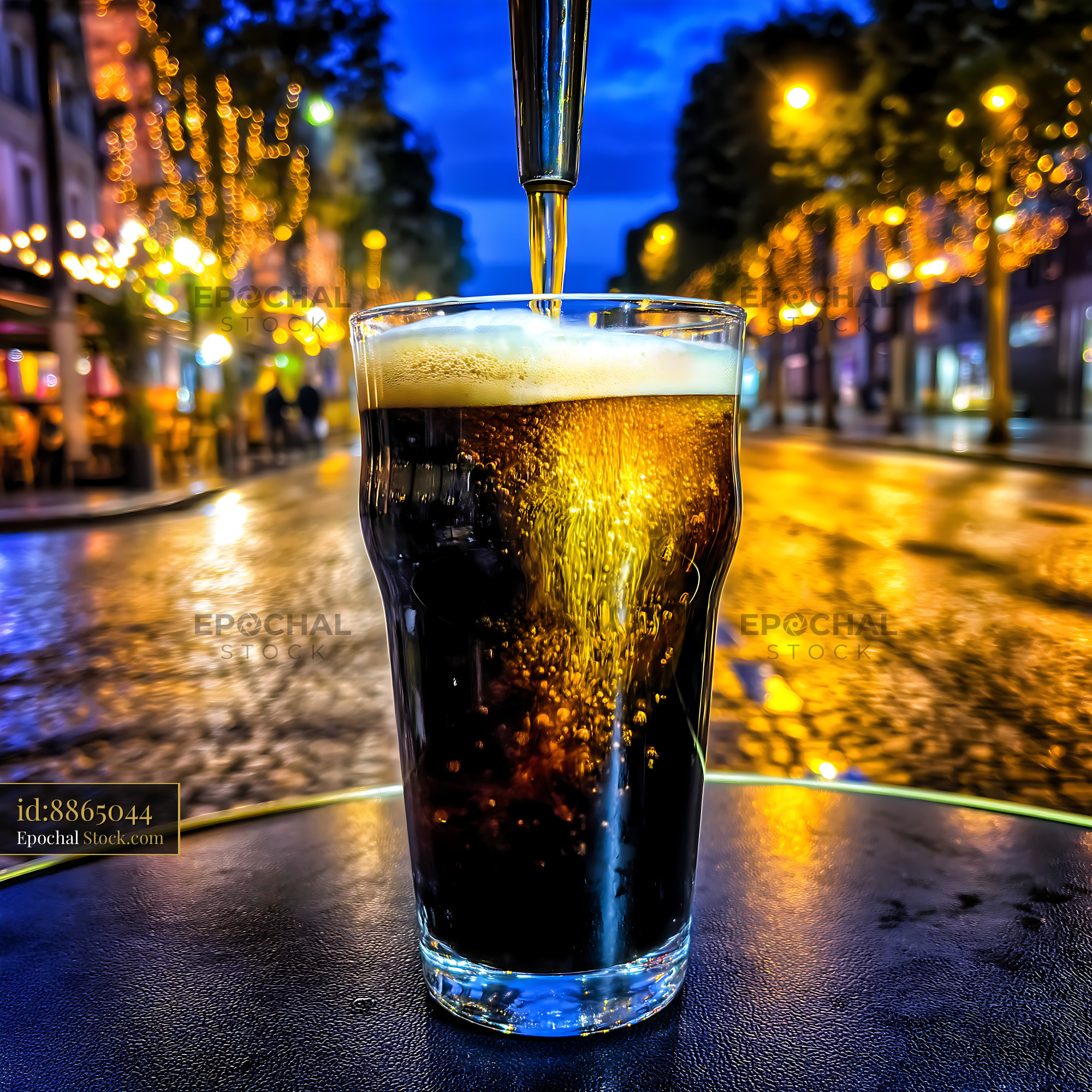 Nitro Caramel Coffee Pouring at Night Urban Setting - stock photo