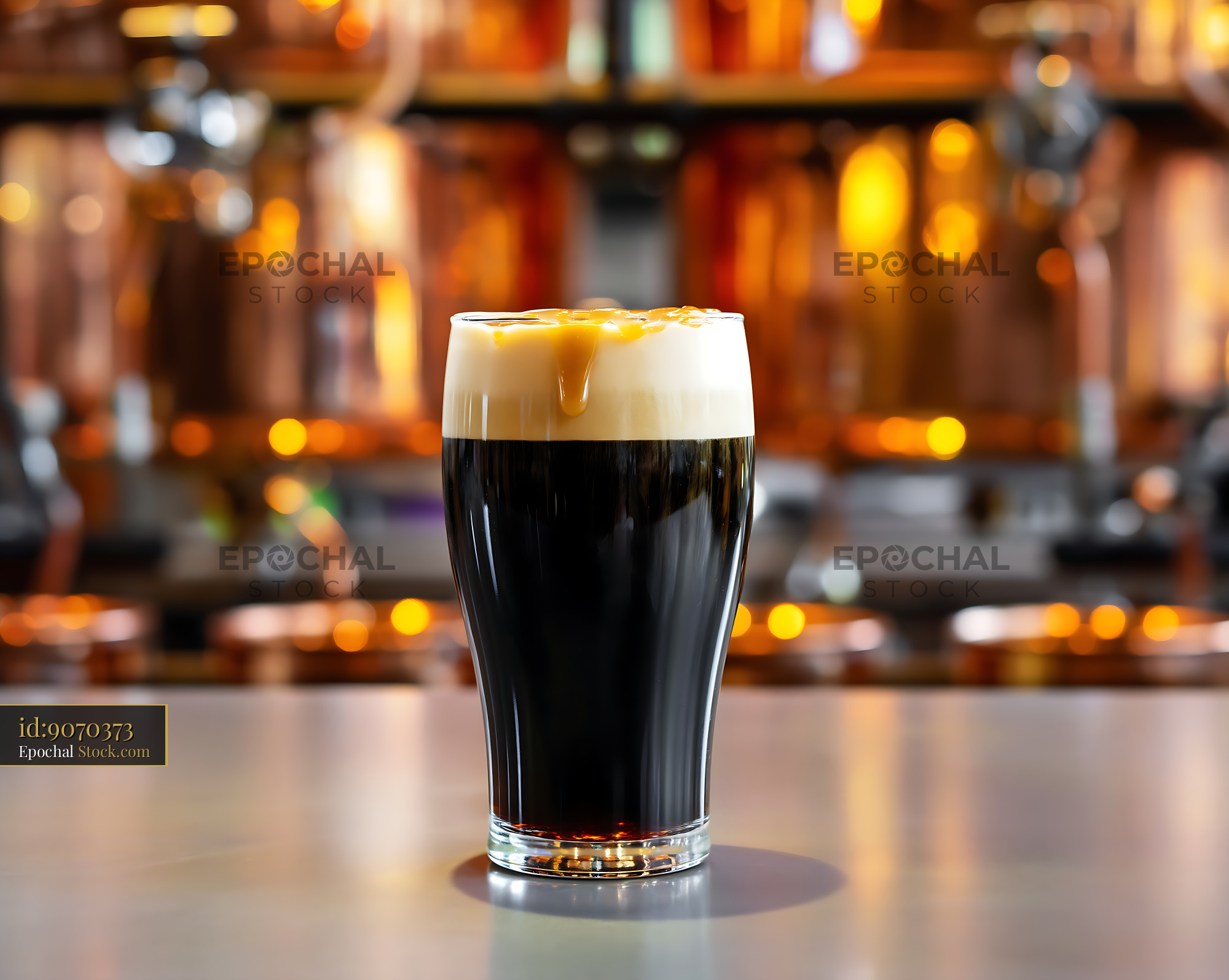 Nitro Caramel Coffee in Pint Glass - stock photo