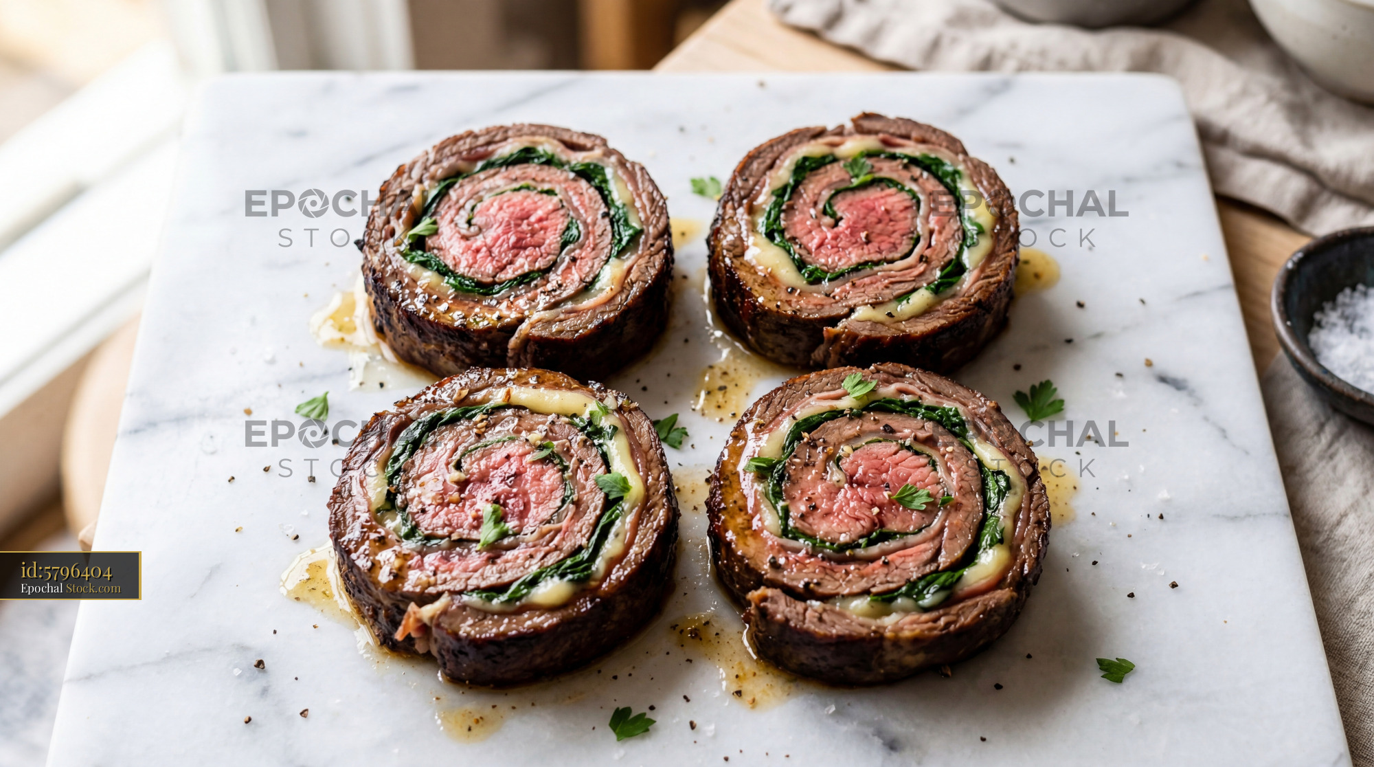 Beef Roulade Steaks with Spinach on Marble Plate - stock photo