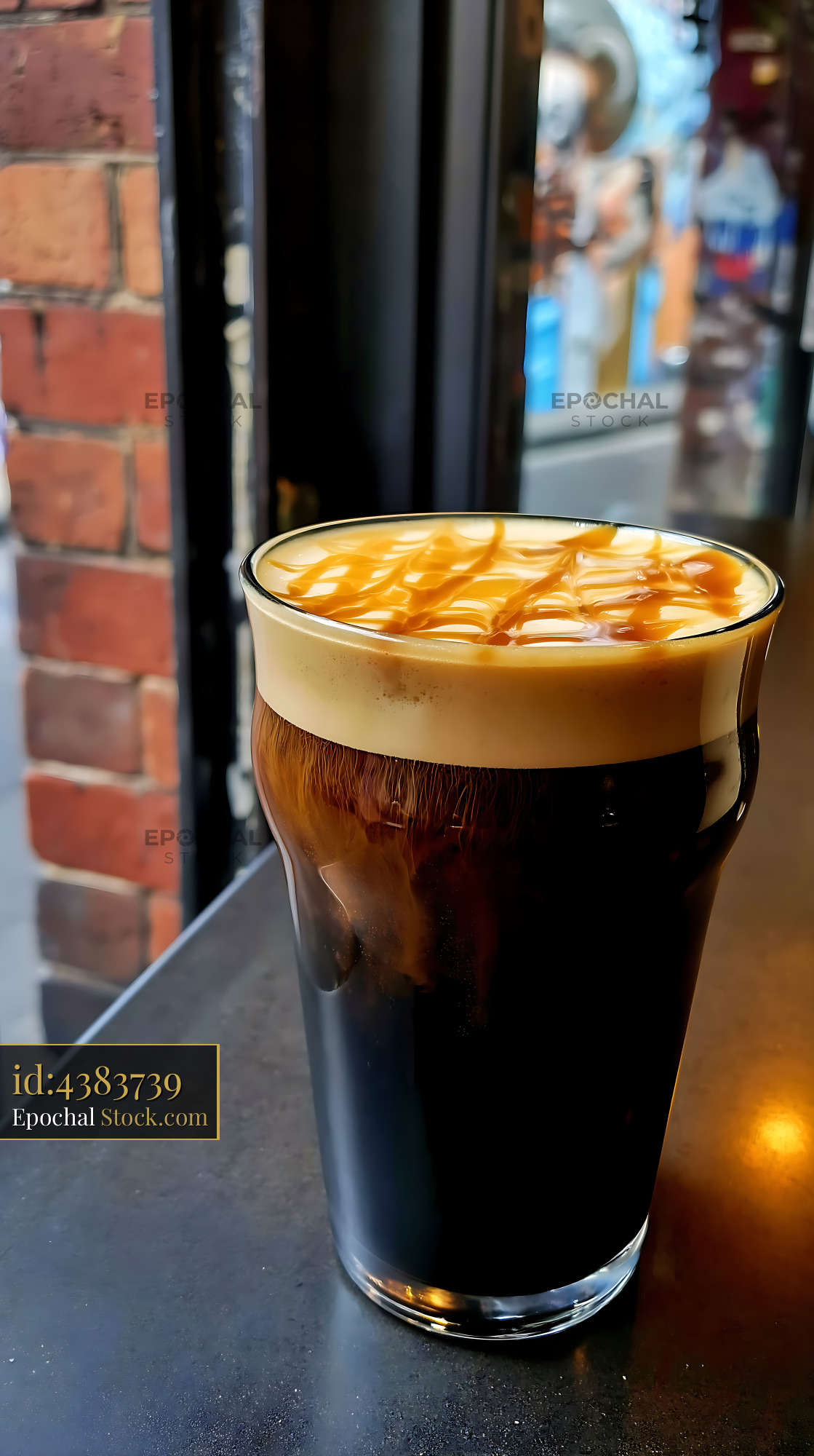 Nitro Caramel Coffee with Latte Art - stock photo