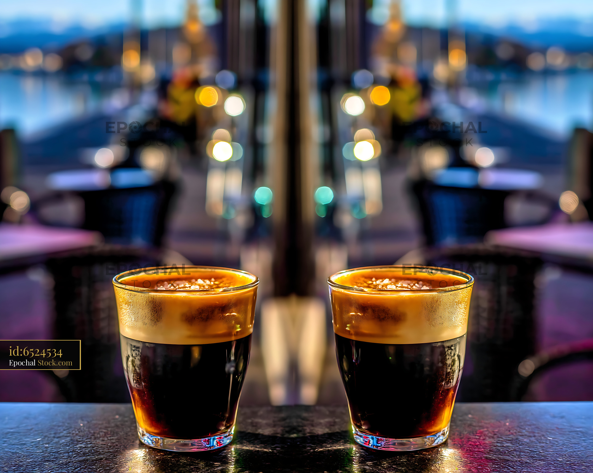Nitro Caramel Coffee Glasses with City Skyline - stock photo