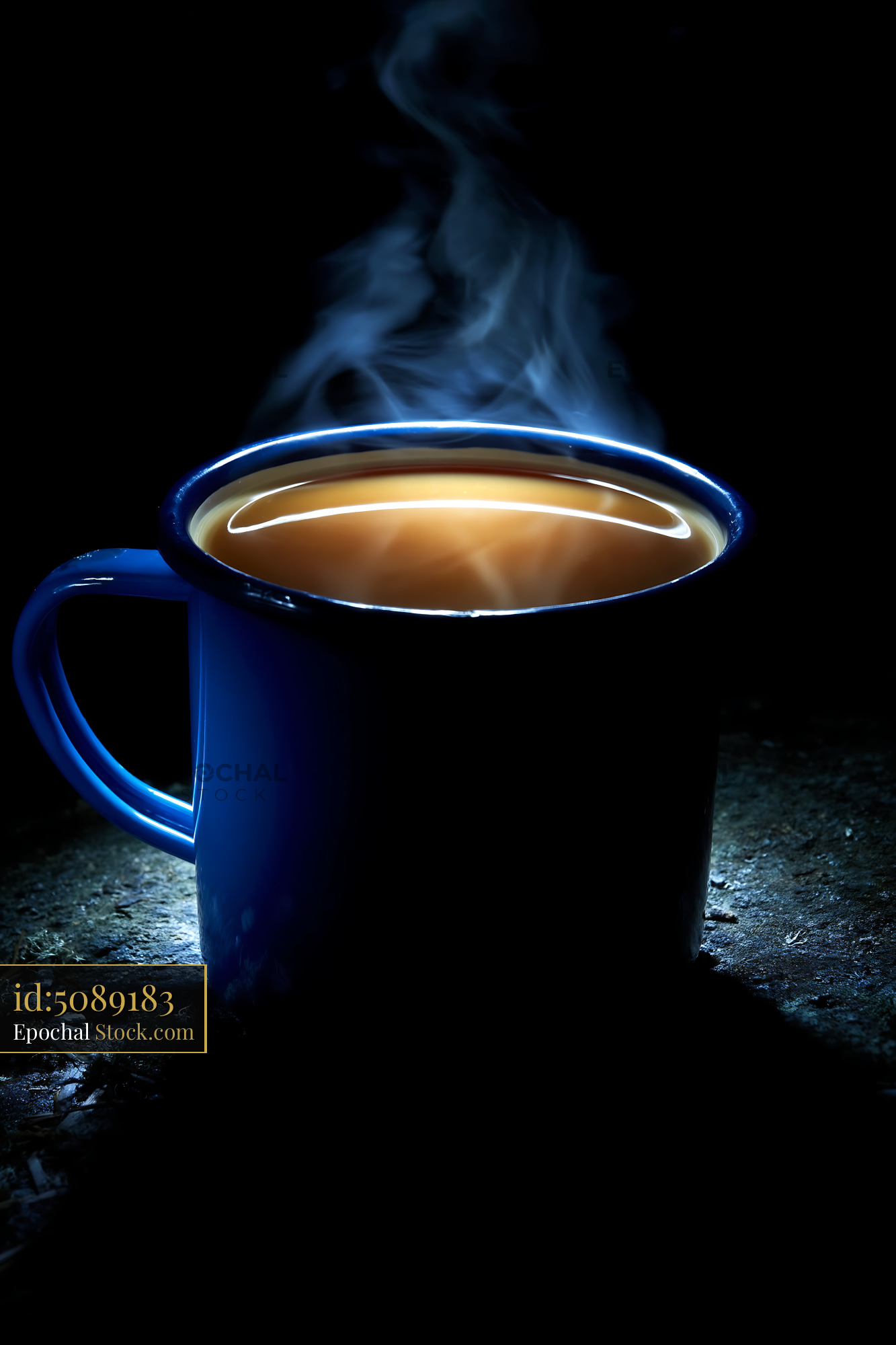Steaming Hot Coffee in Glowing Blue Enamel Mug - stock photo