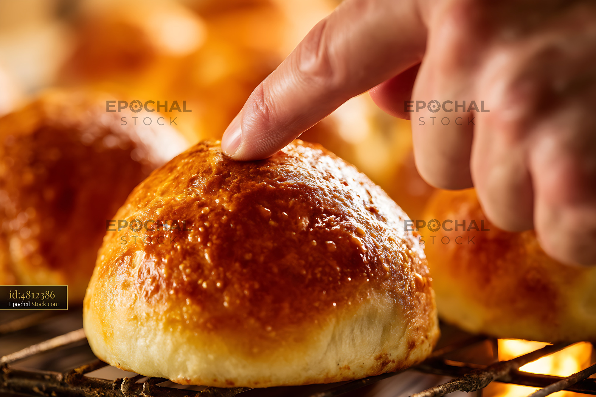 Fresh Baked Bread Roll Being Picked Warm - stock photo