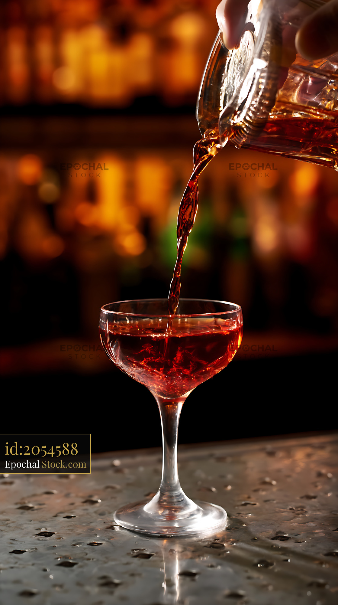 Bushwick Cocktail Pouring Into Coupe Glass - stock photo