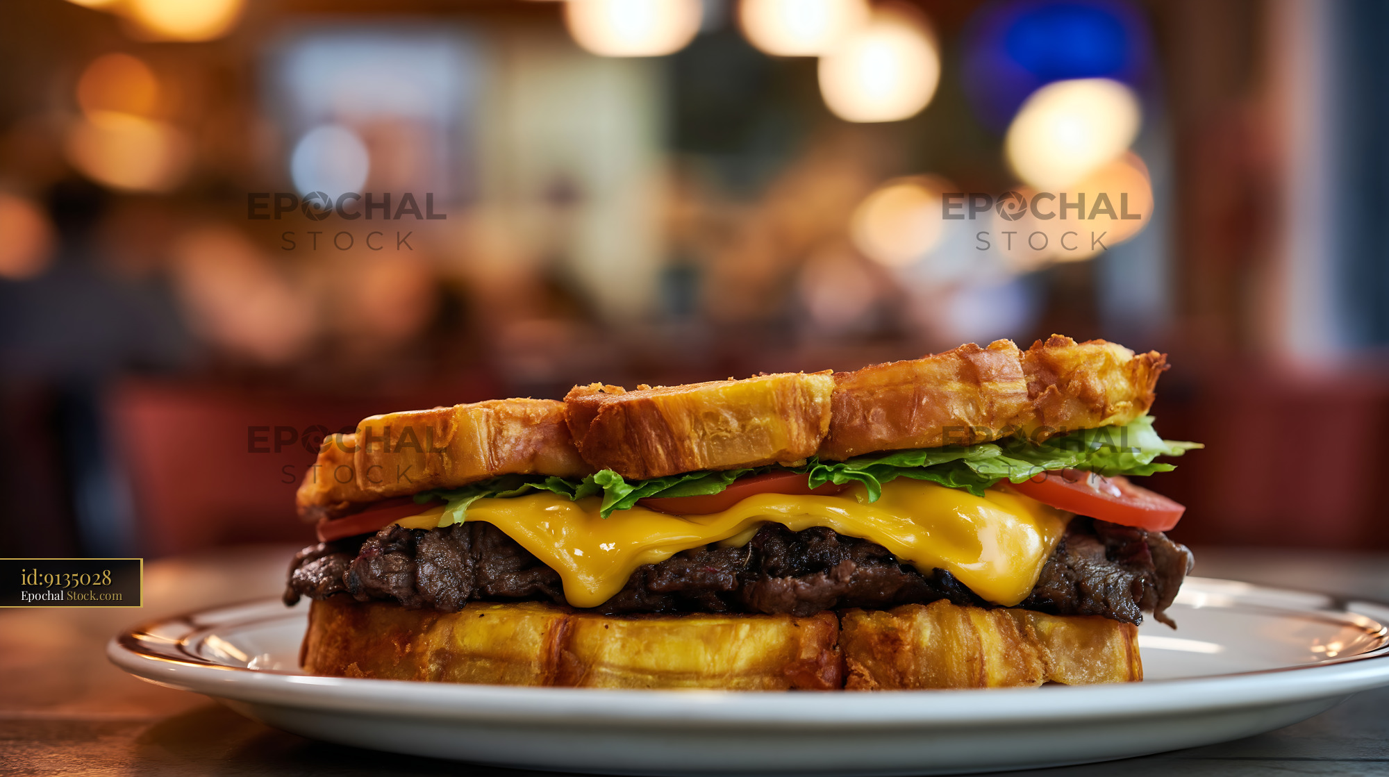 Gourmet Cheeseburger on Croissant Bread - stock photo
