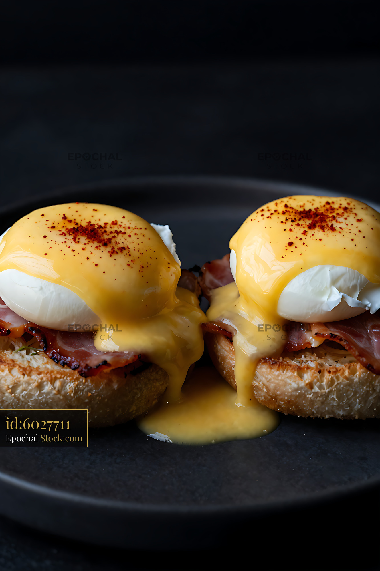 Eggs Benedict with Hollandaise Sauce Dripping - stock photo