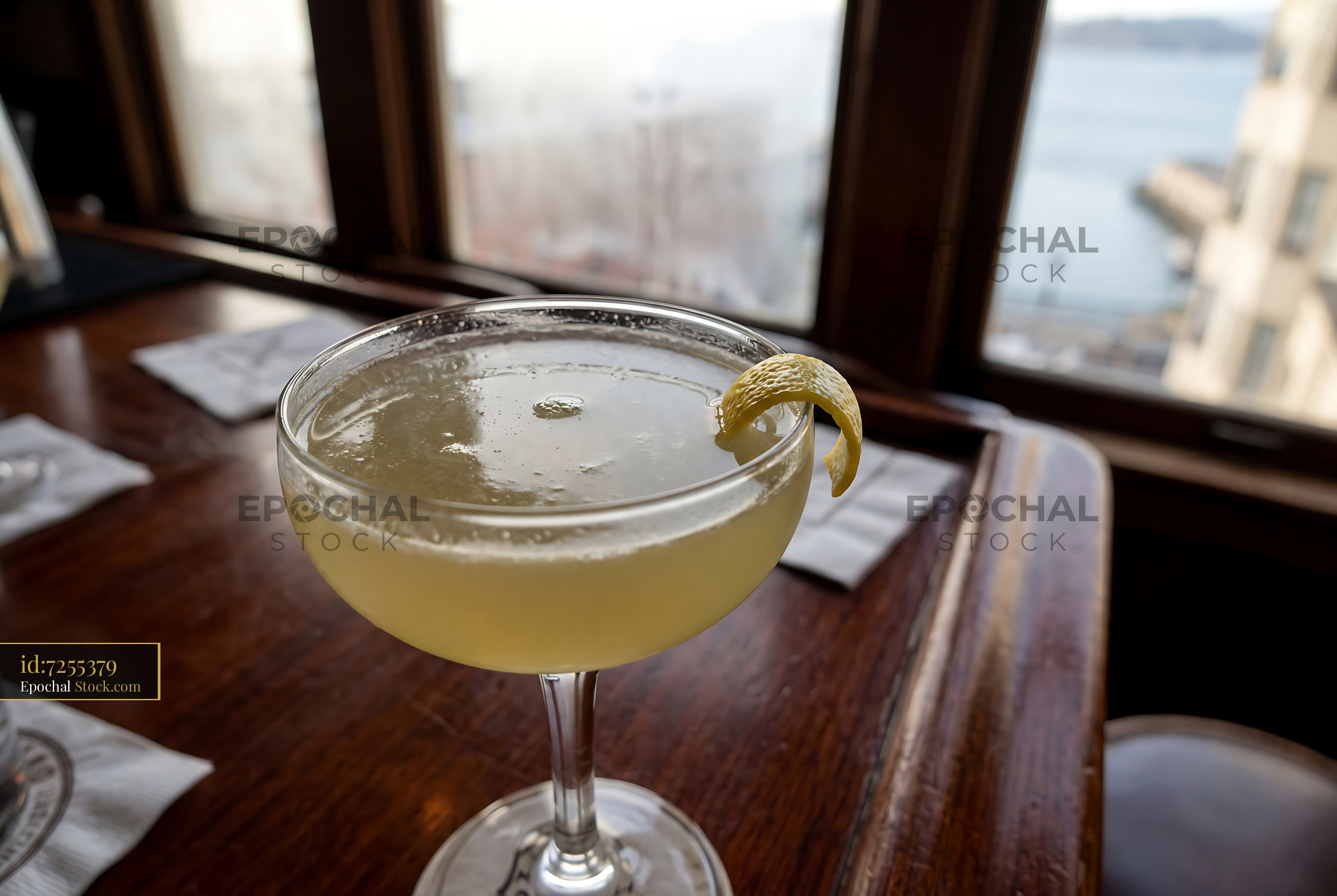Final Ward Cocktail with Lemon Twist at Window - stock photo