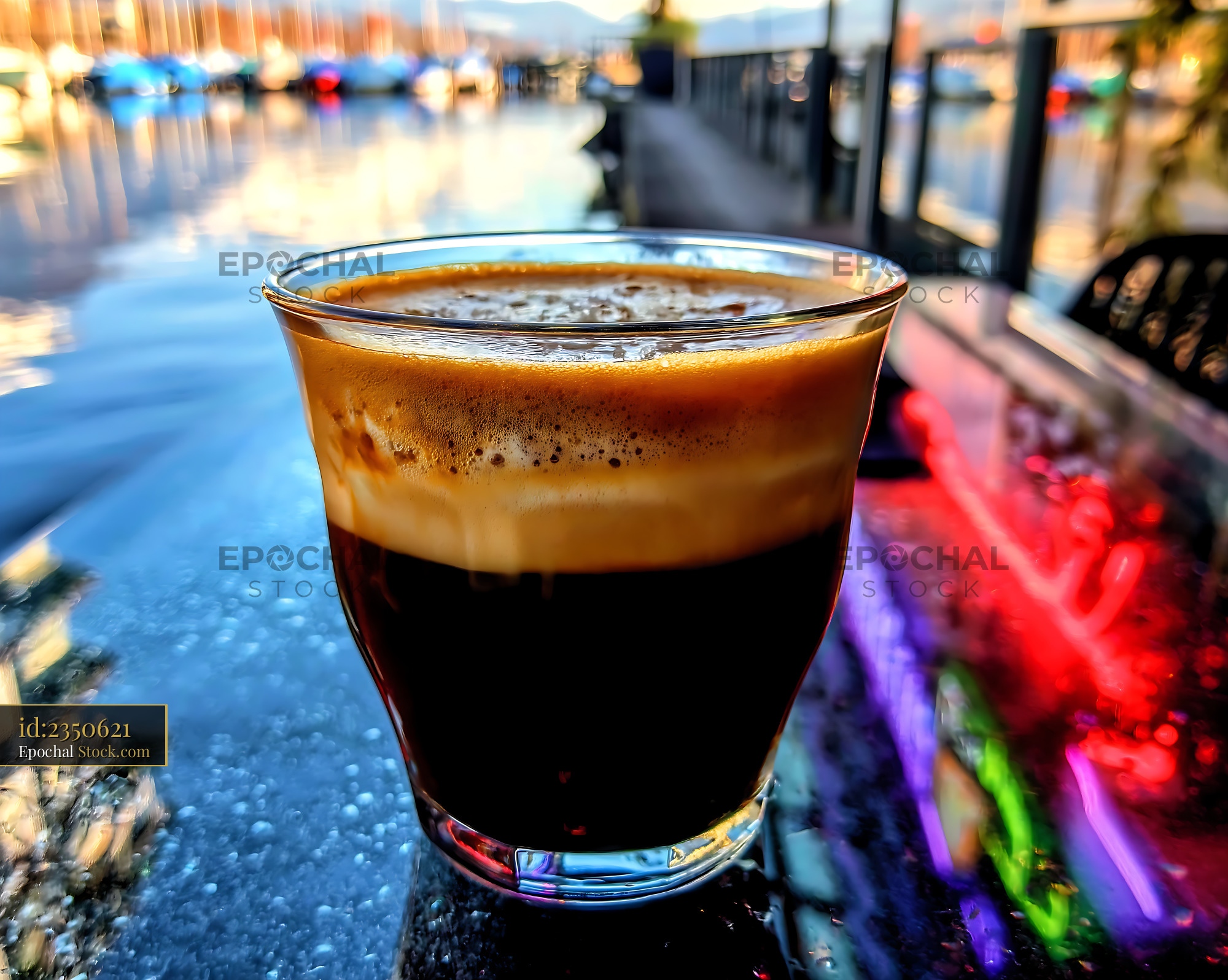 Nitro Caramel Coffee at Waterfront Dock Sunset - stock photo