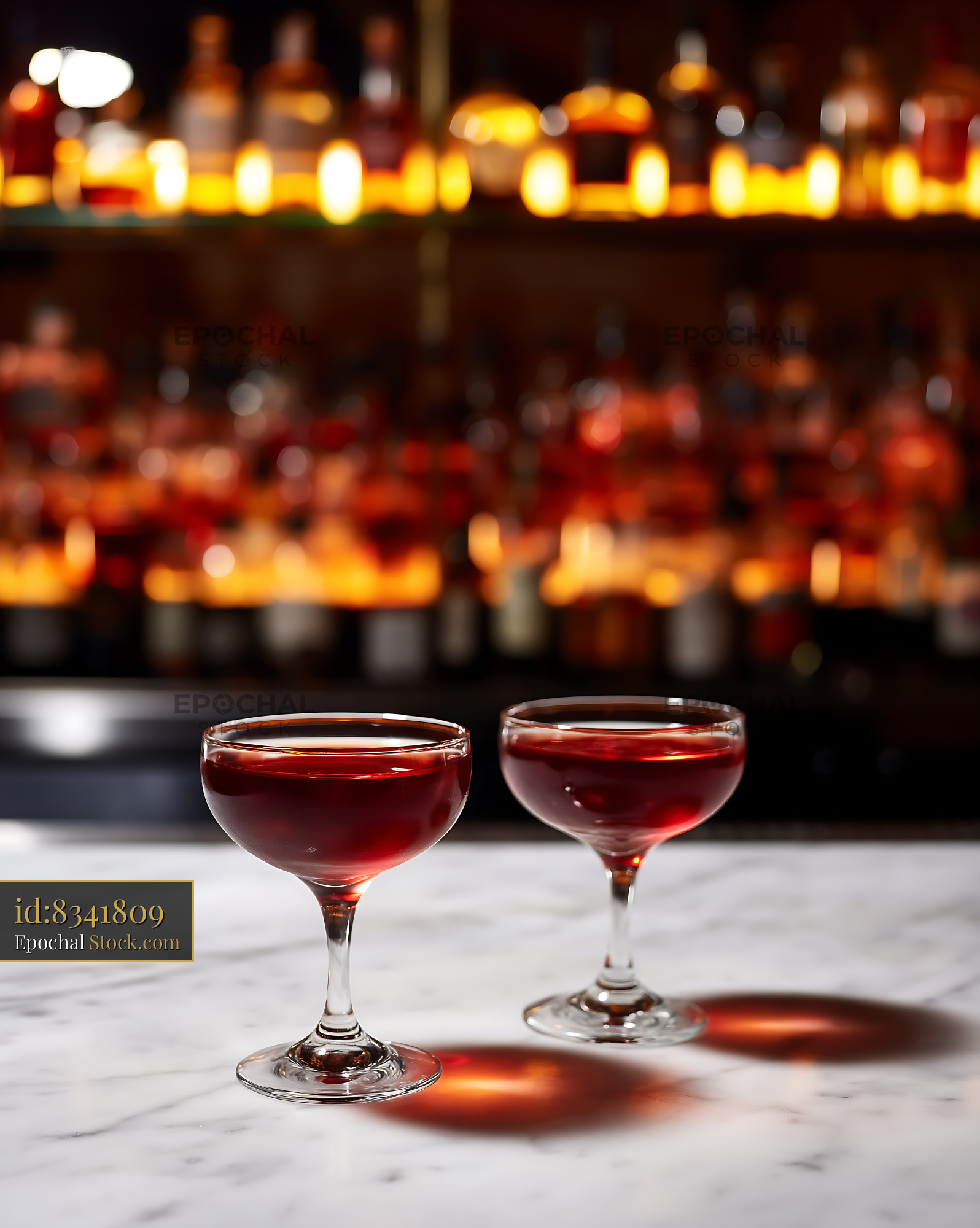 Bushwick Cocktail Pair on Marble Bar Counter - stock photo