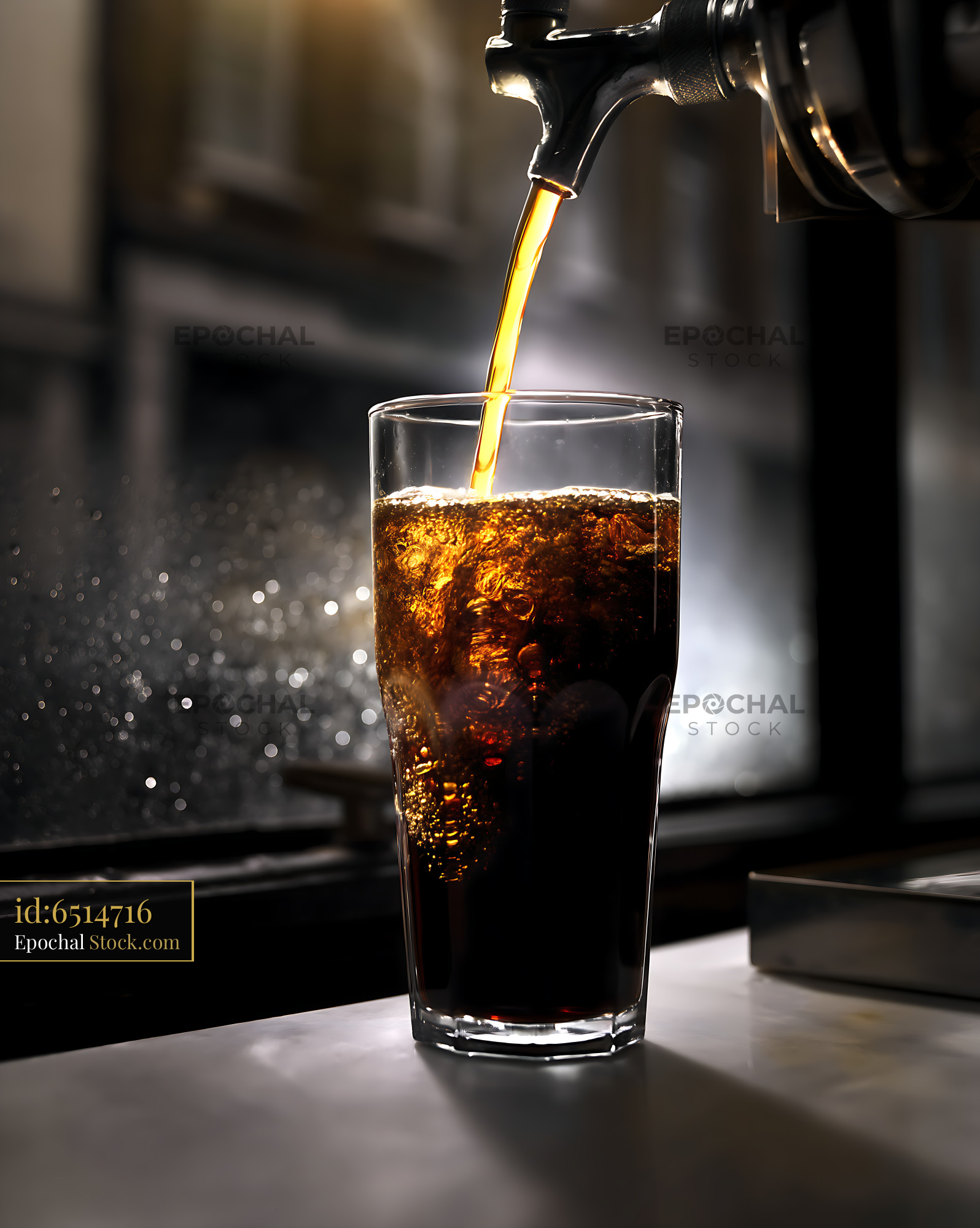 Nitro Caramel Coffee Pour Into Tall Glass - stock photo