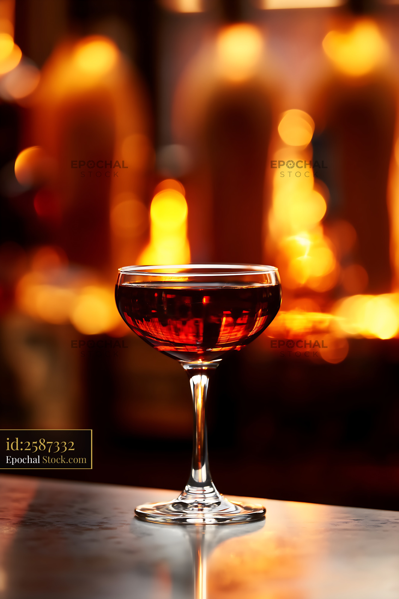 Bushwick Cocktail in Coupe Glass with Ambient Light - stock photo