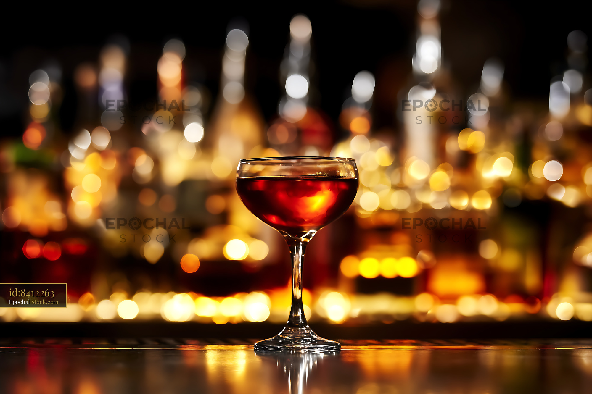 Bushwick Cocktail in Glass Against Warm City Lights - stock photo