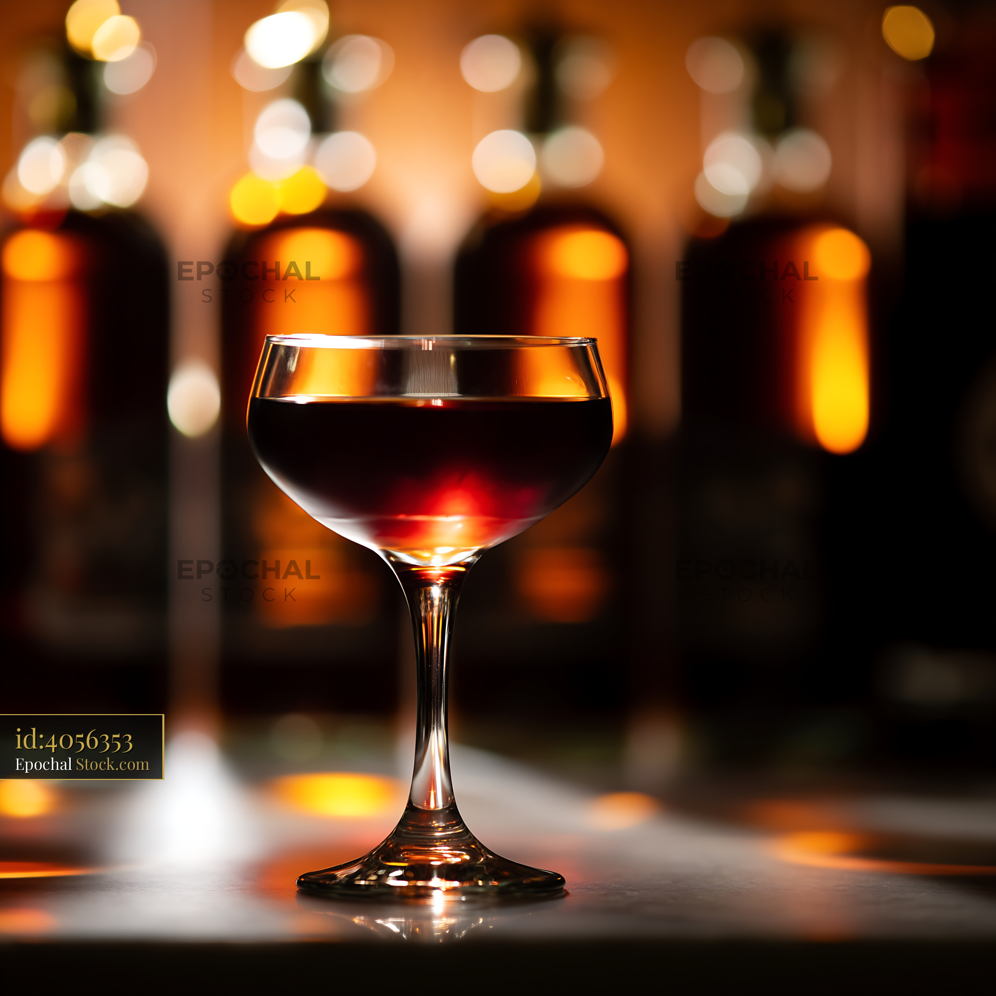 Luxury Cocktail in Elegant Glass with Warm Bokeh - stock photo