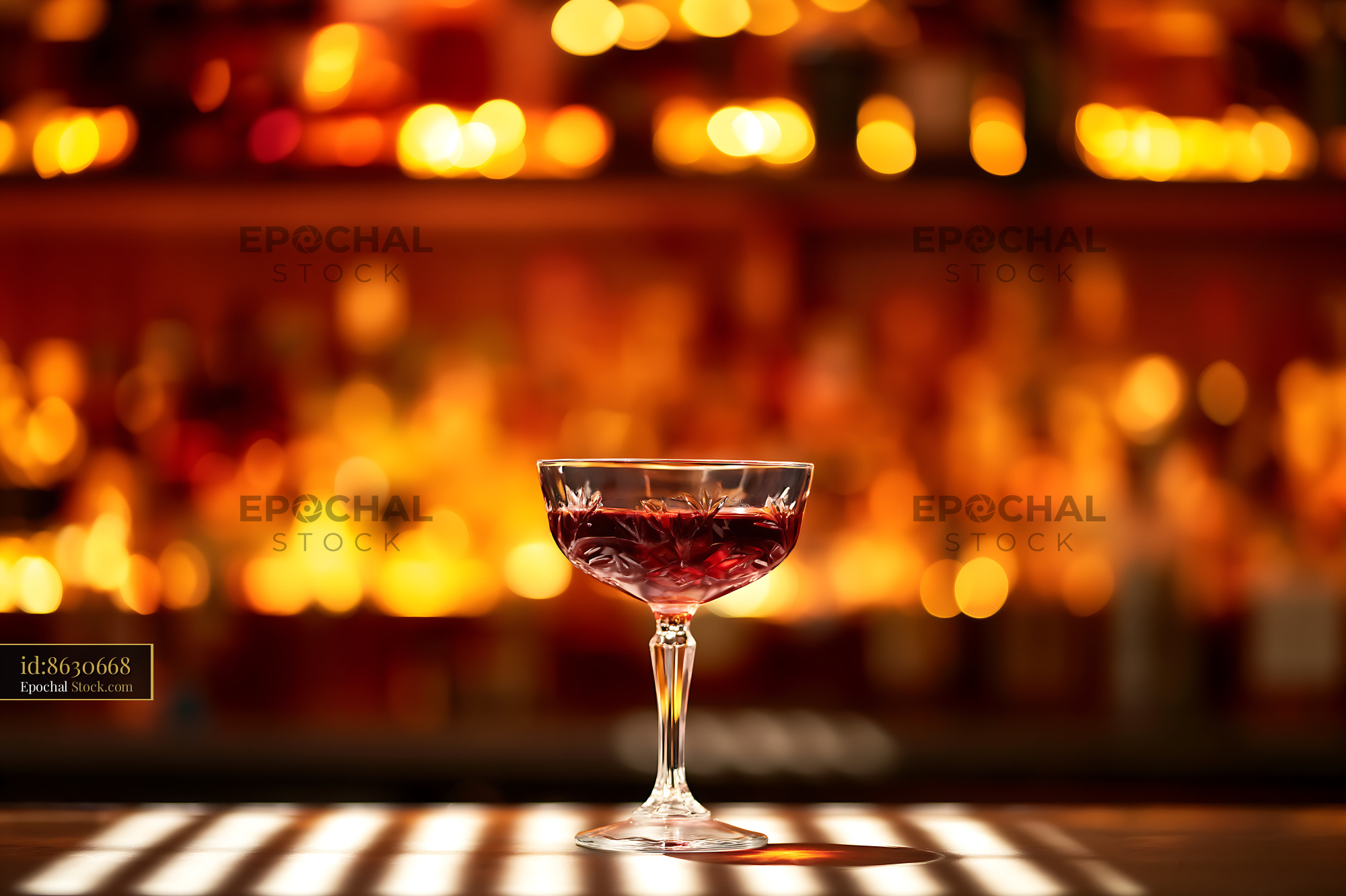 Bushwick Cocktail in Coupe Glass at Bar - stock photo