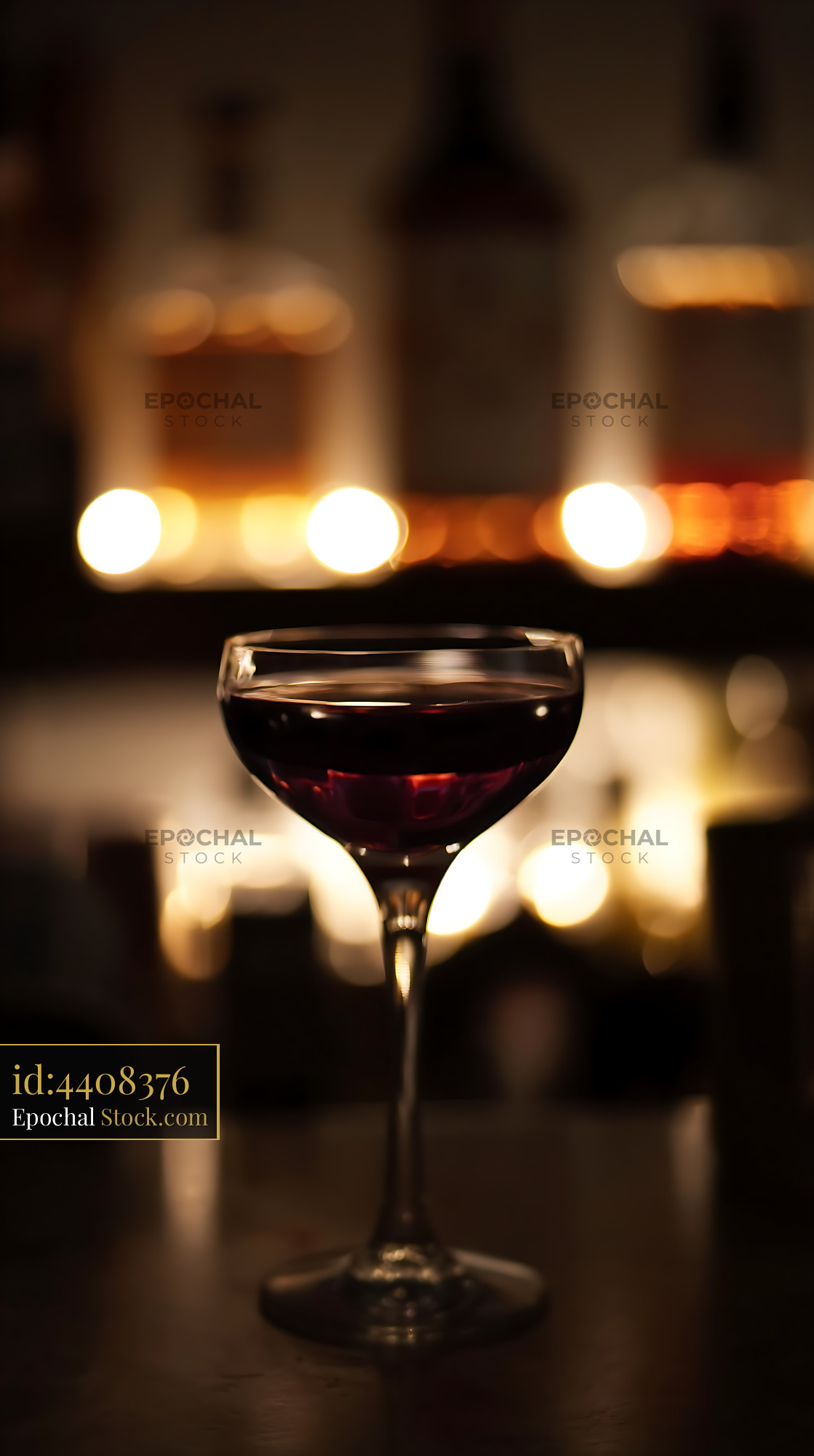 Bushwick Cocktail in Coupe Glass with Candlelight - stock photo